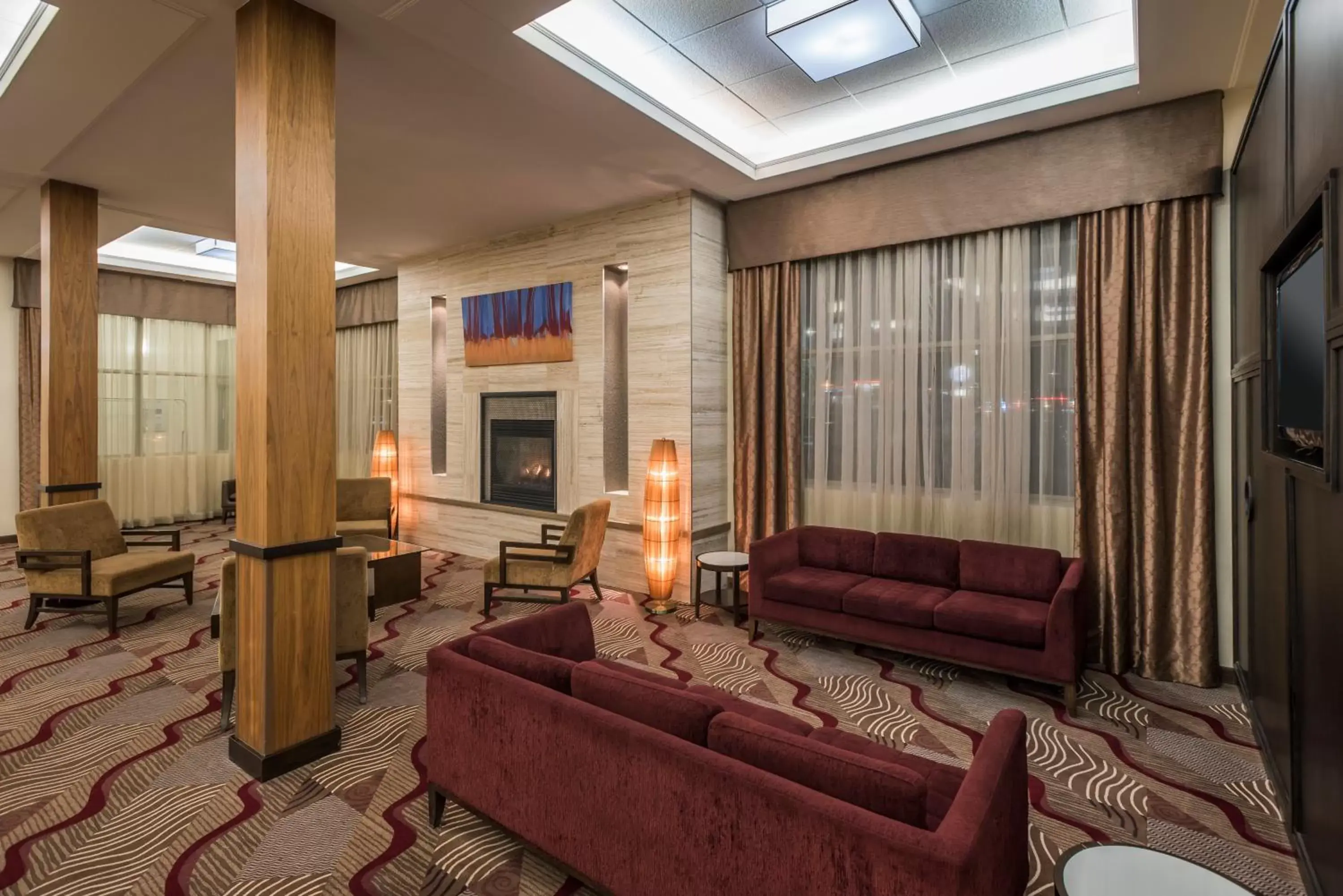 Lobby or reception, Seating Area in Holiday Inn Lethbridge, an IHG Hotel