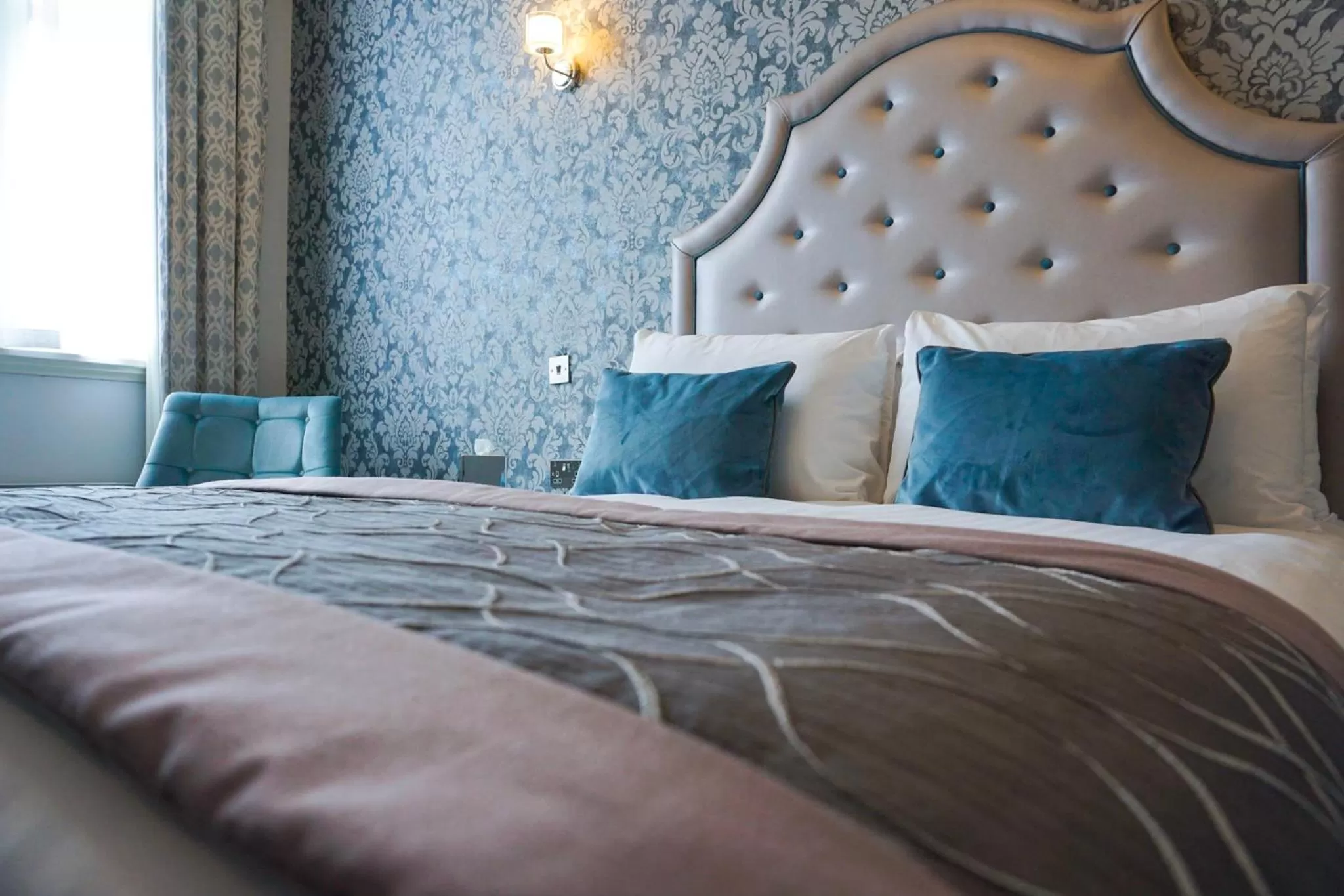 Bed in Wroxall Abbey Hotel