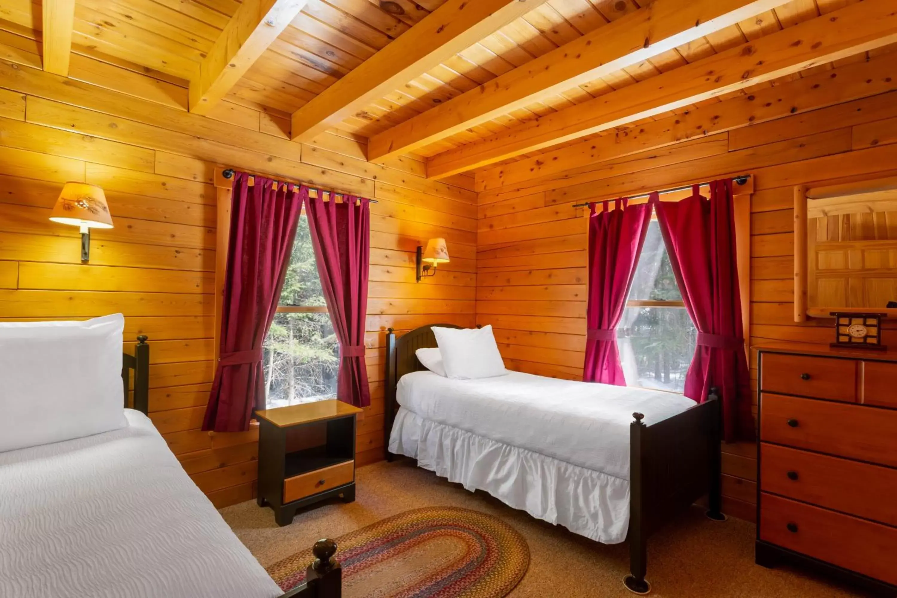 Bed in Rangeley Lake Resort a Ramada by Wyndham