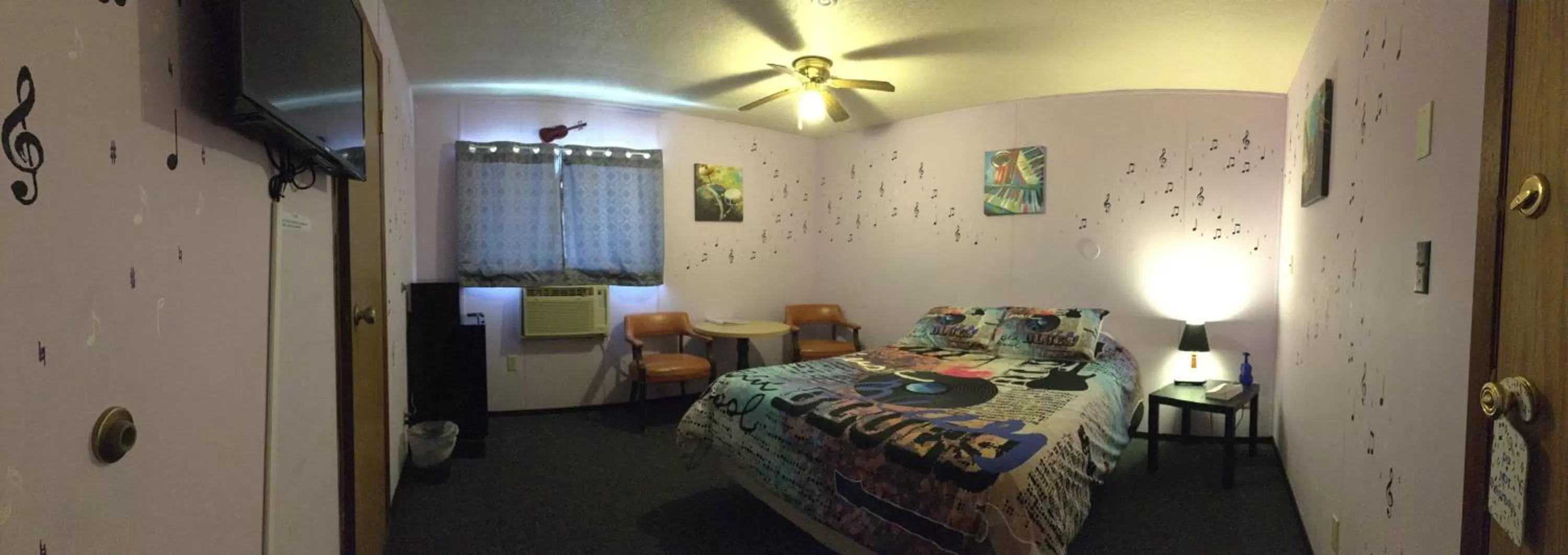 Bed in Sunset View Inn L.L.C