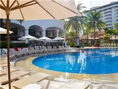 Swimming Pool in VILLA PARA 5 Personas 4 adultos y 1 Menor En HOTEL TSORO IXTAPA WIFI GRATIS