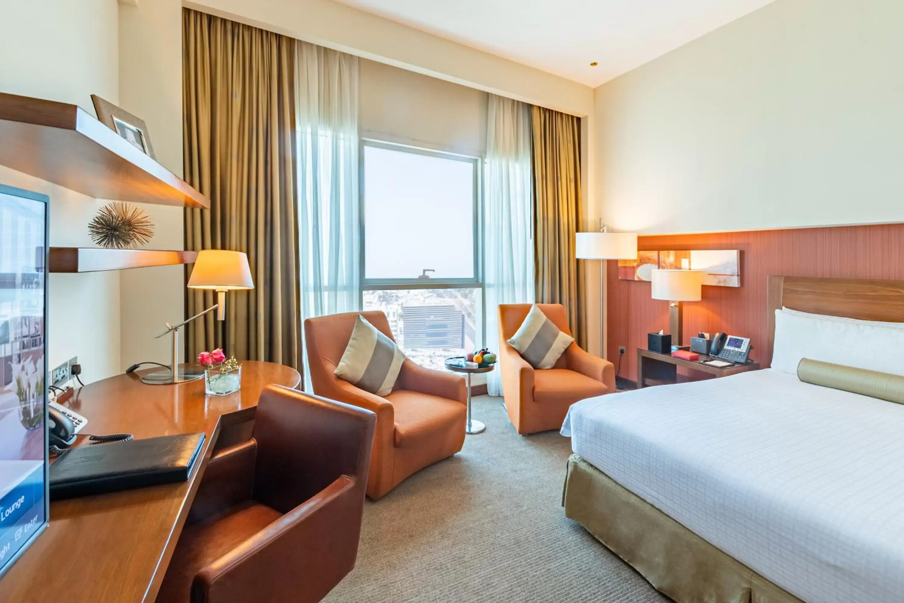 TV and multimedia in Grand Millennium Al Wahda Hotel and Executive Apartments Abu Dhabi
