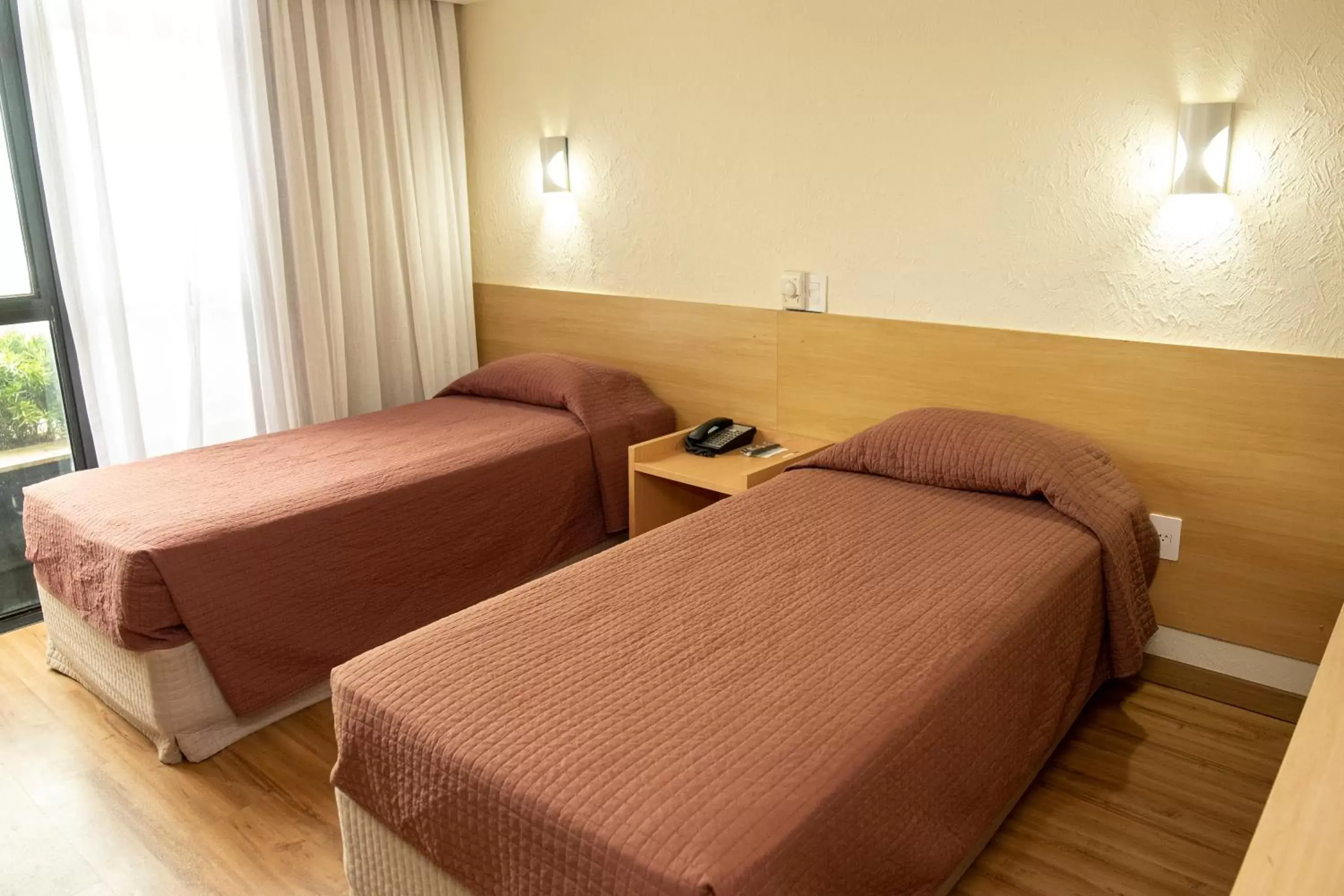 Bed in Marante Plaza Hotel