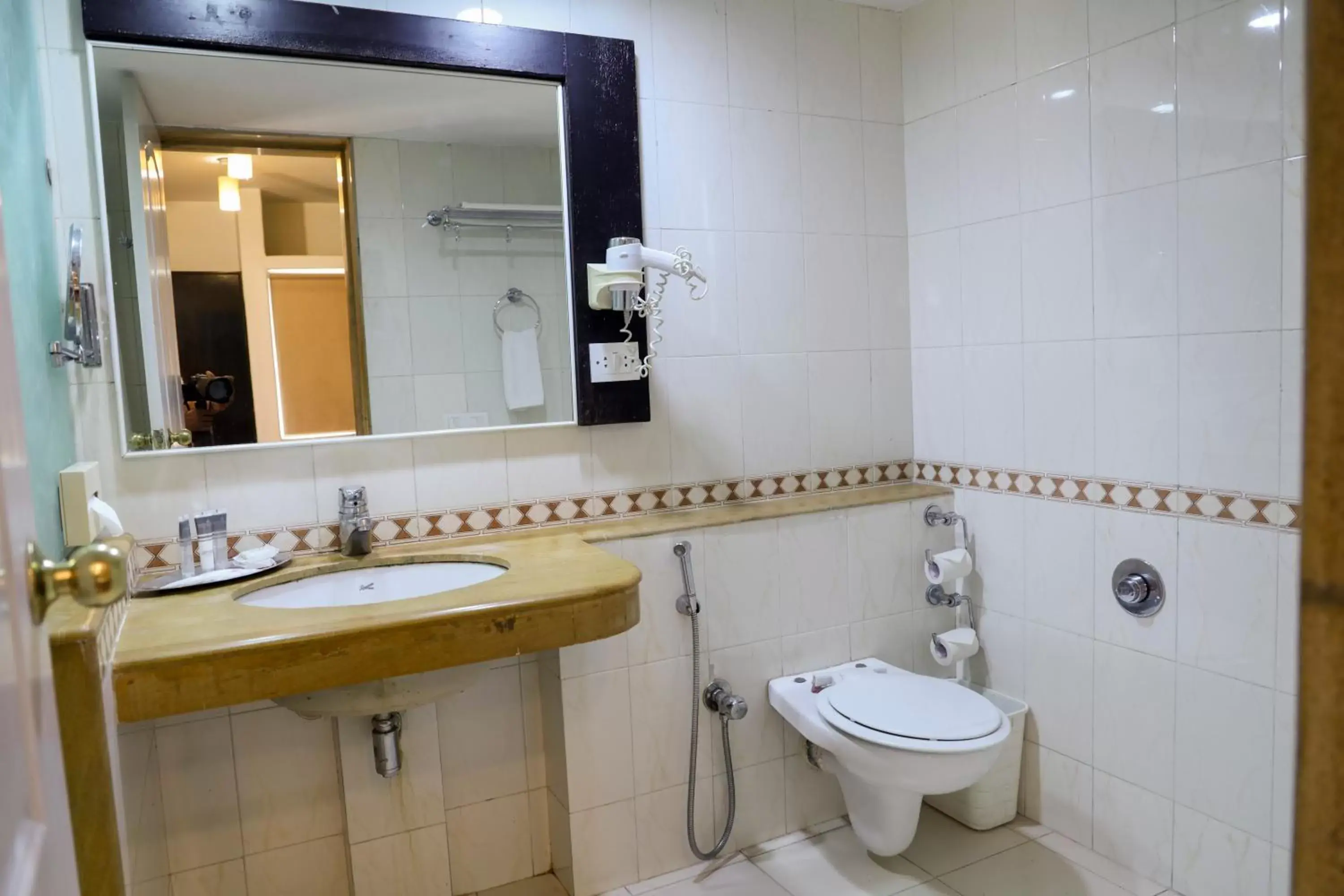 Bathroom in Royal Orchid Golden Suites Pune
