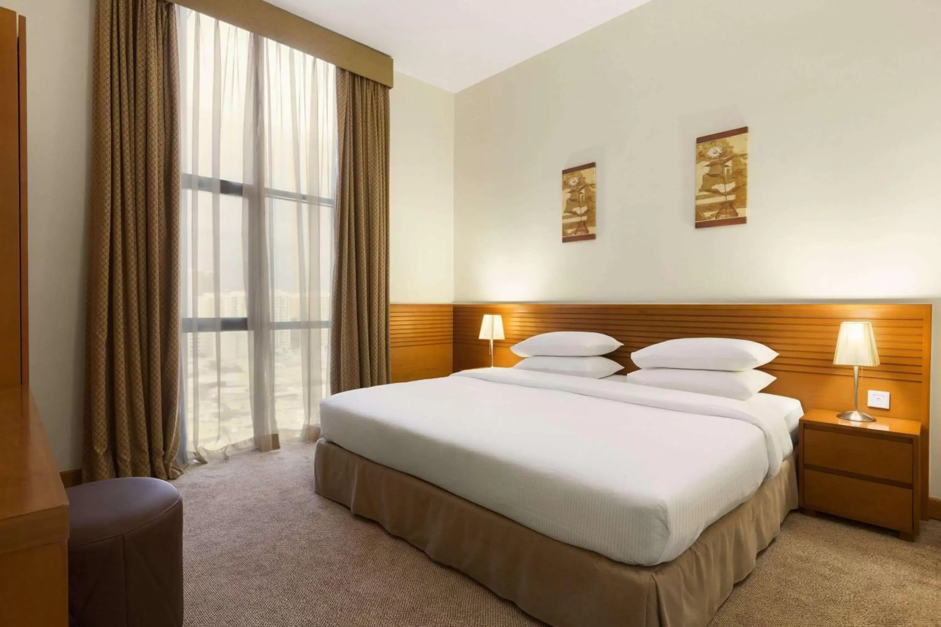 Photo of the whole room, Bed in Ramada Hotel & Suites by Wyndham Ajman