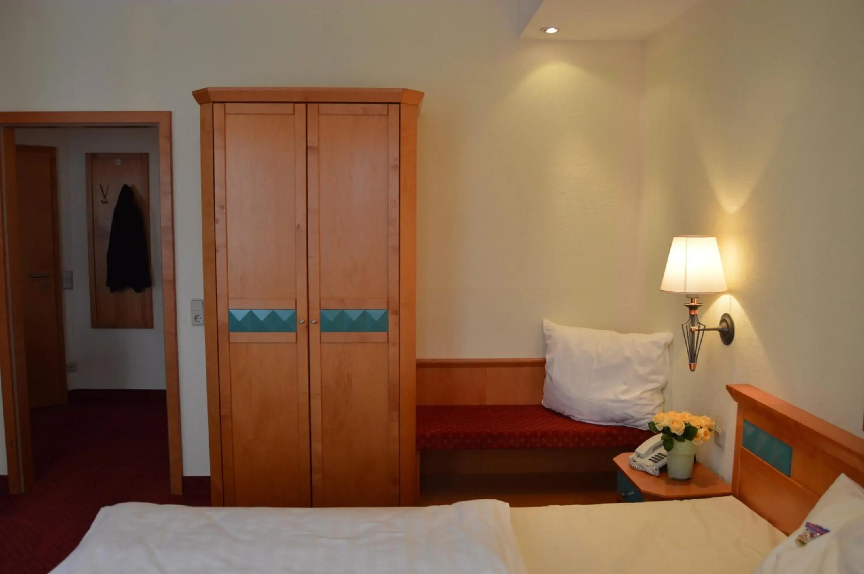 Seating area, Bed in Arkaden Hotel
