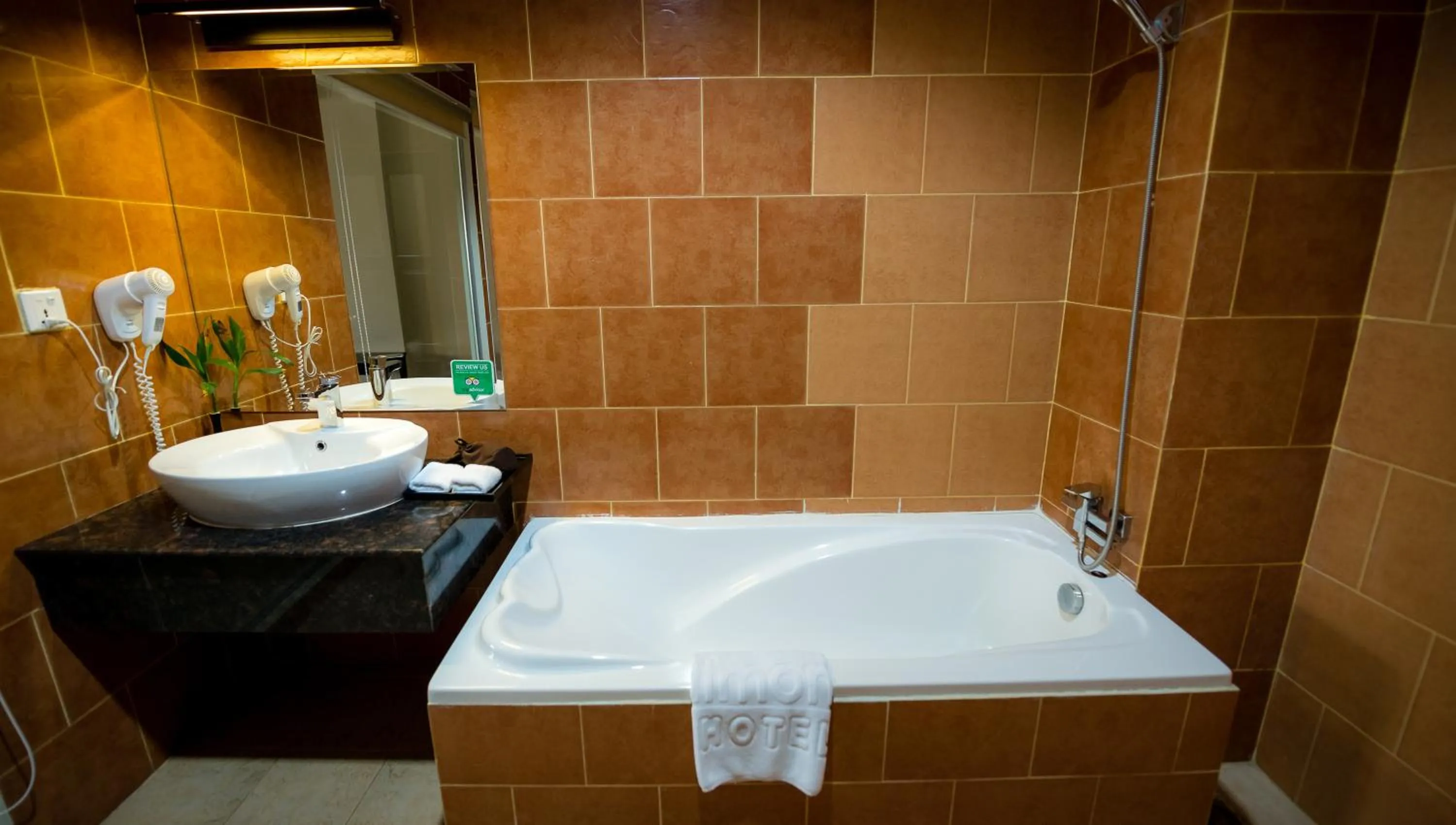 Shower in Almond Hotel Sothearos