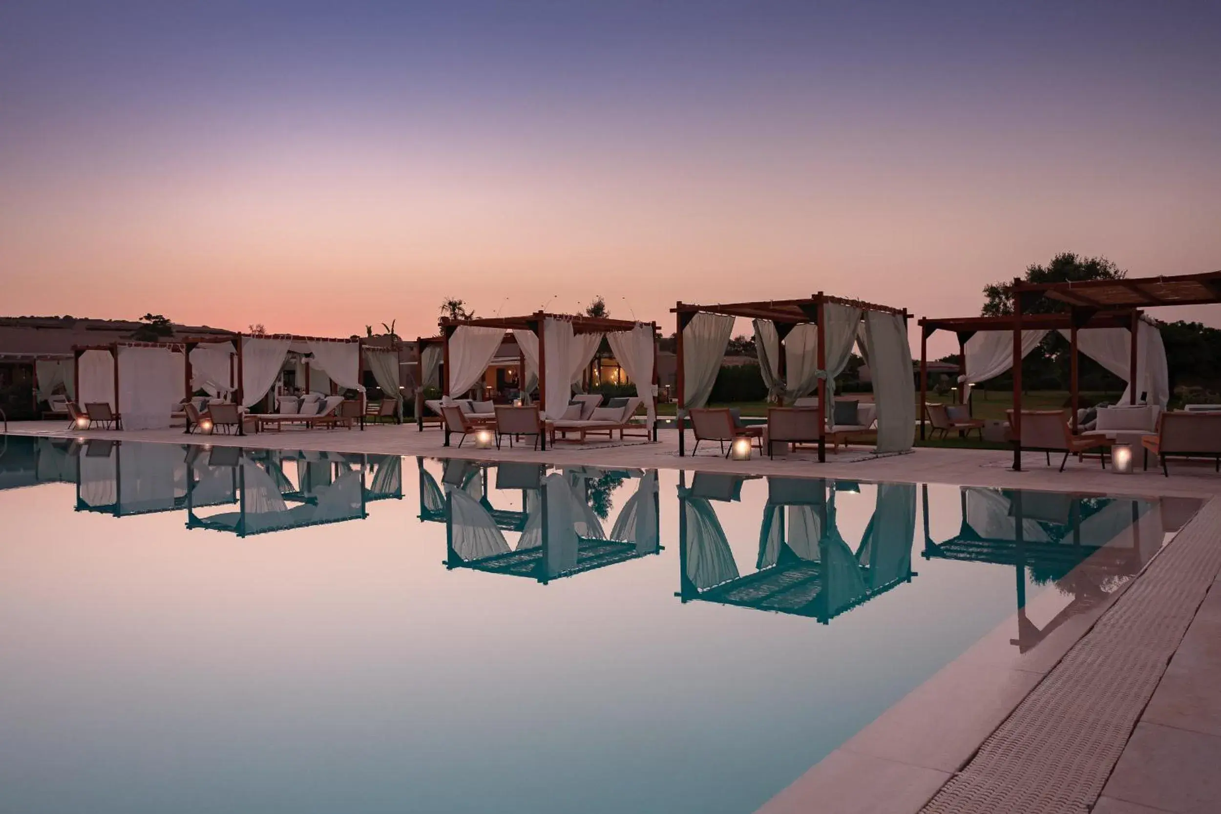 Pool view, Sunrise/Sunset in Baglioni Resort Sardinia - The Leading Hotels of the World