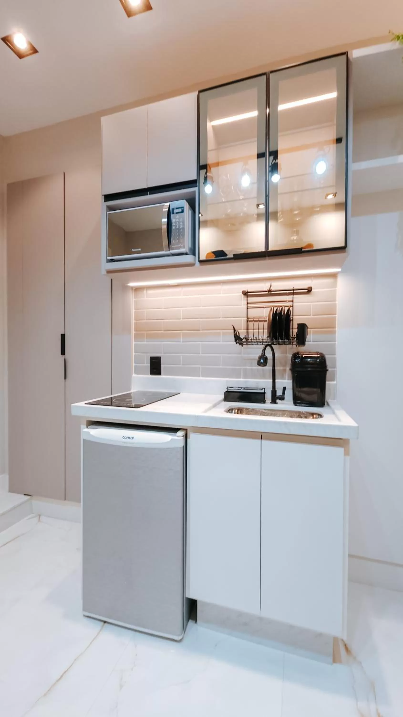 Kitchen or kitchenette in Suítes Água Marinha