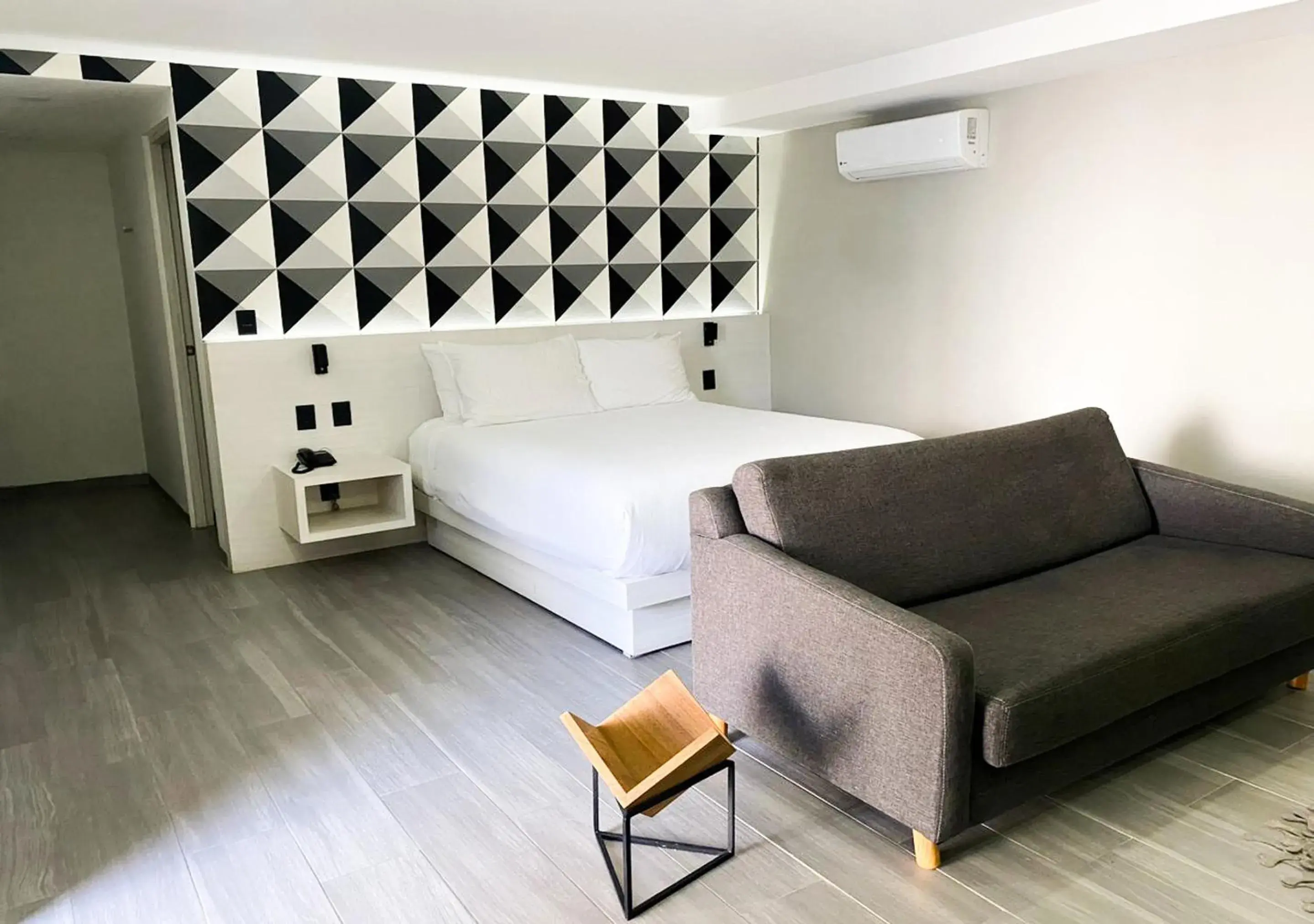 Living room, Bed in The Andy Hotel by DOT Boutique