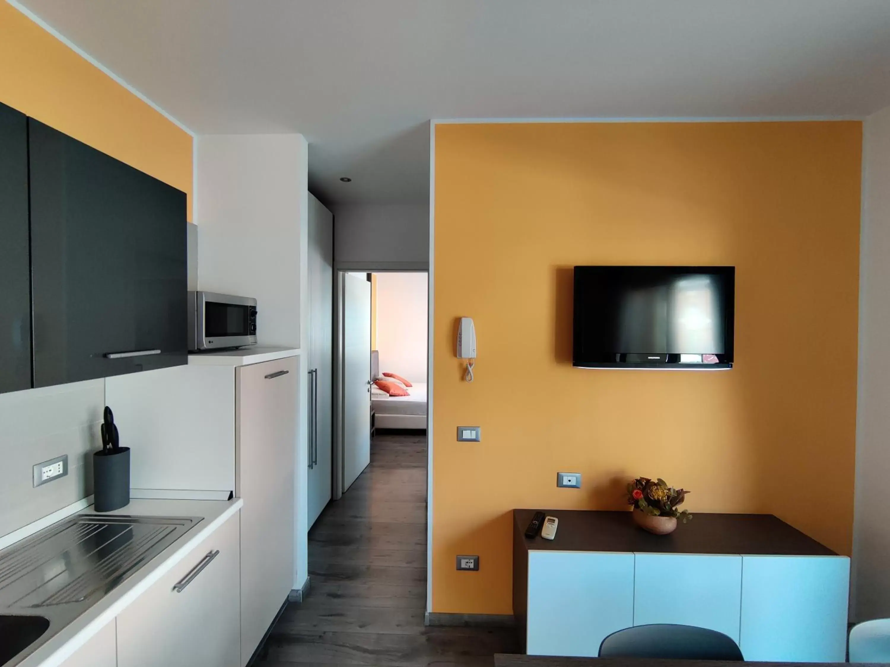 kitchen, TV/Entertainment Center in Gardesana Active Apartments