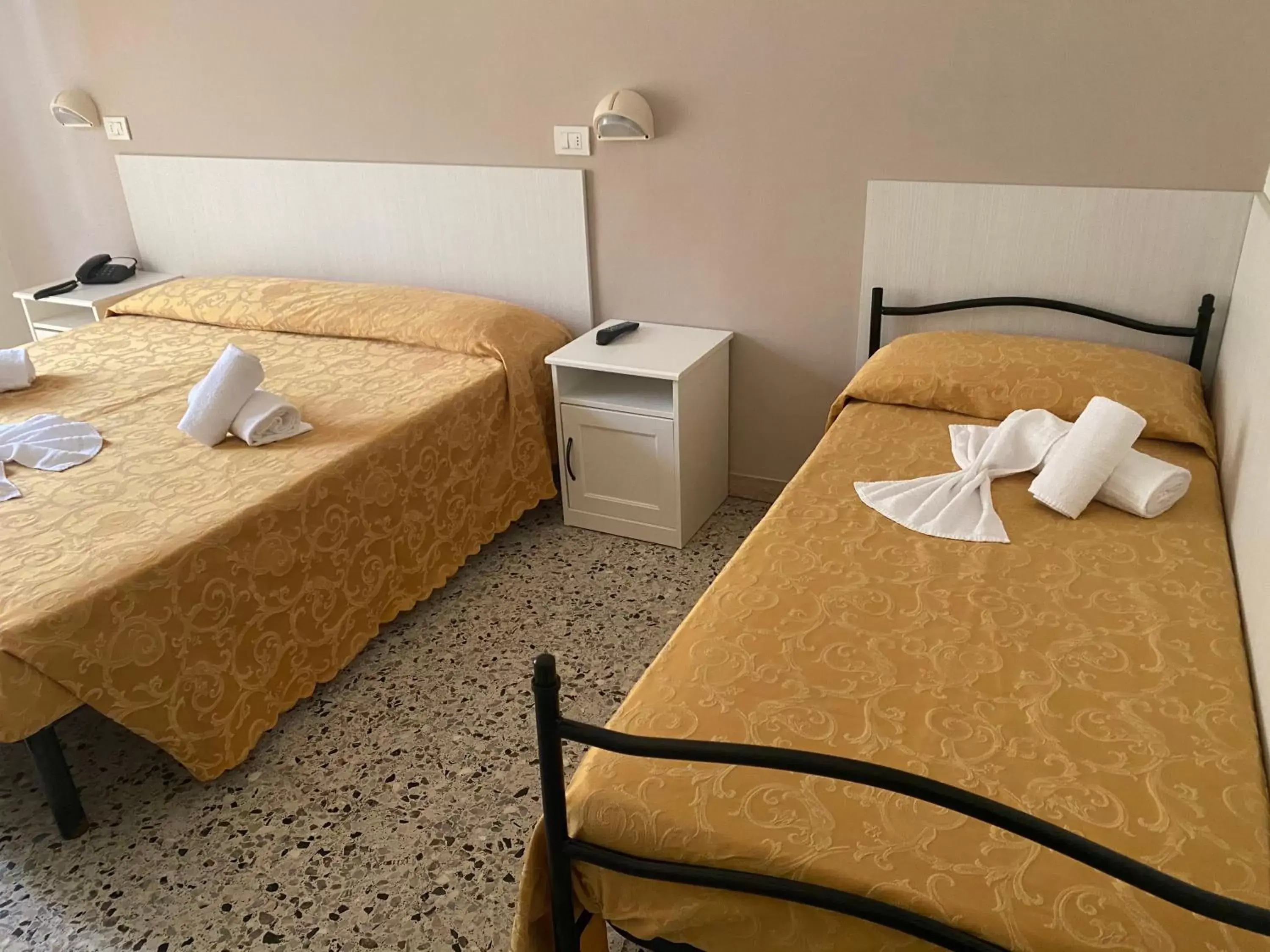 Bed in Hotel Modenese