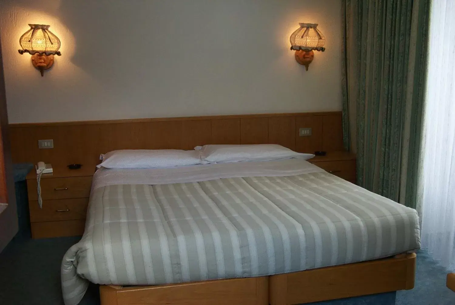 Bed in Hotel Ottoz Meublé