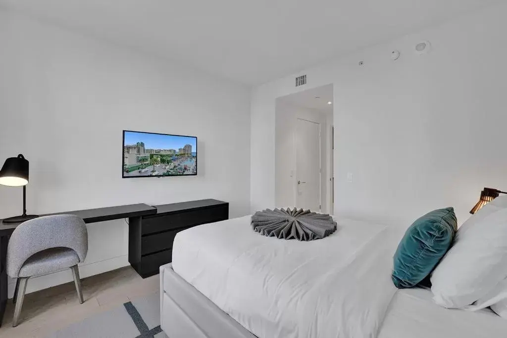 Bed in Amazing Apartments at H Beach House