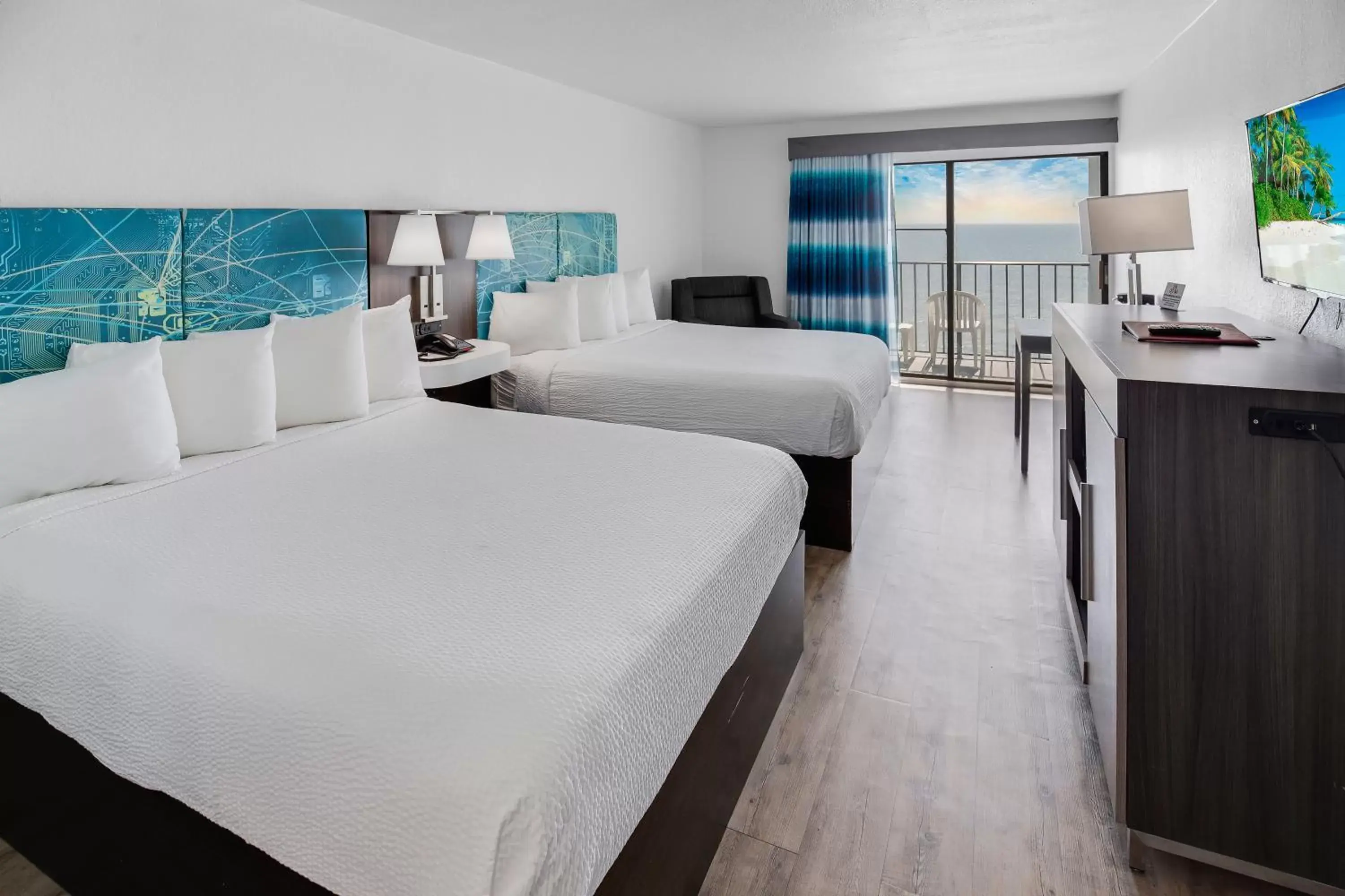 Bed in Tropical Seas Hotel