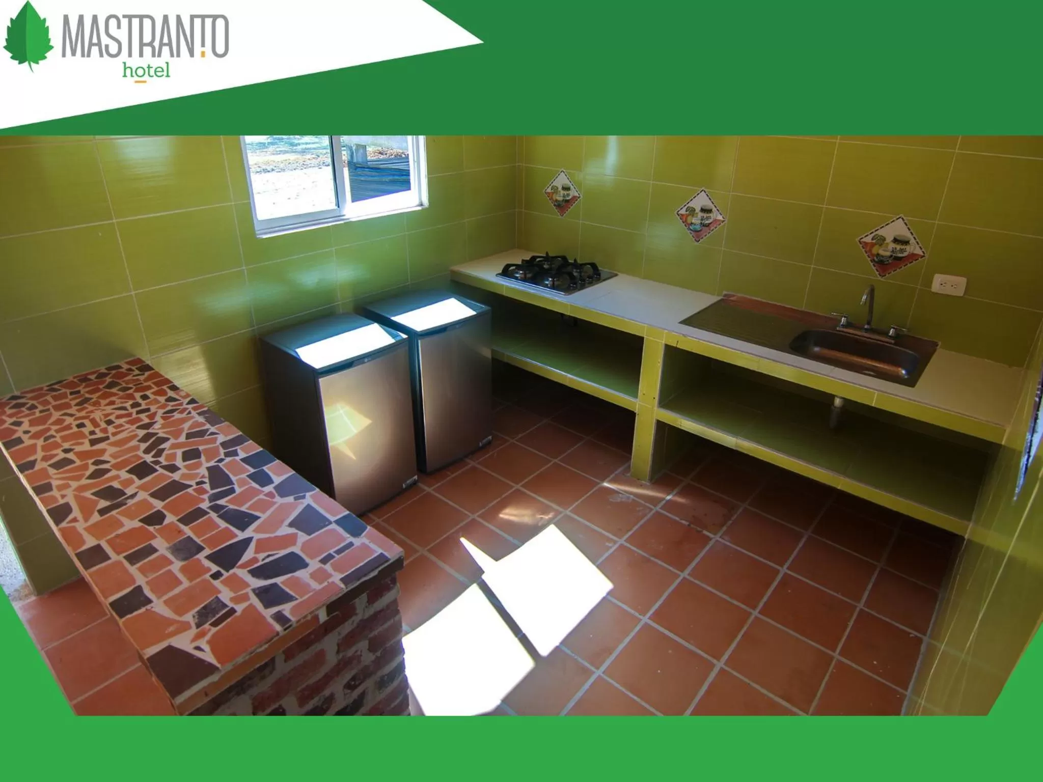 Kitchen or kitchenette in Hotel Mastranto