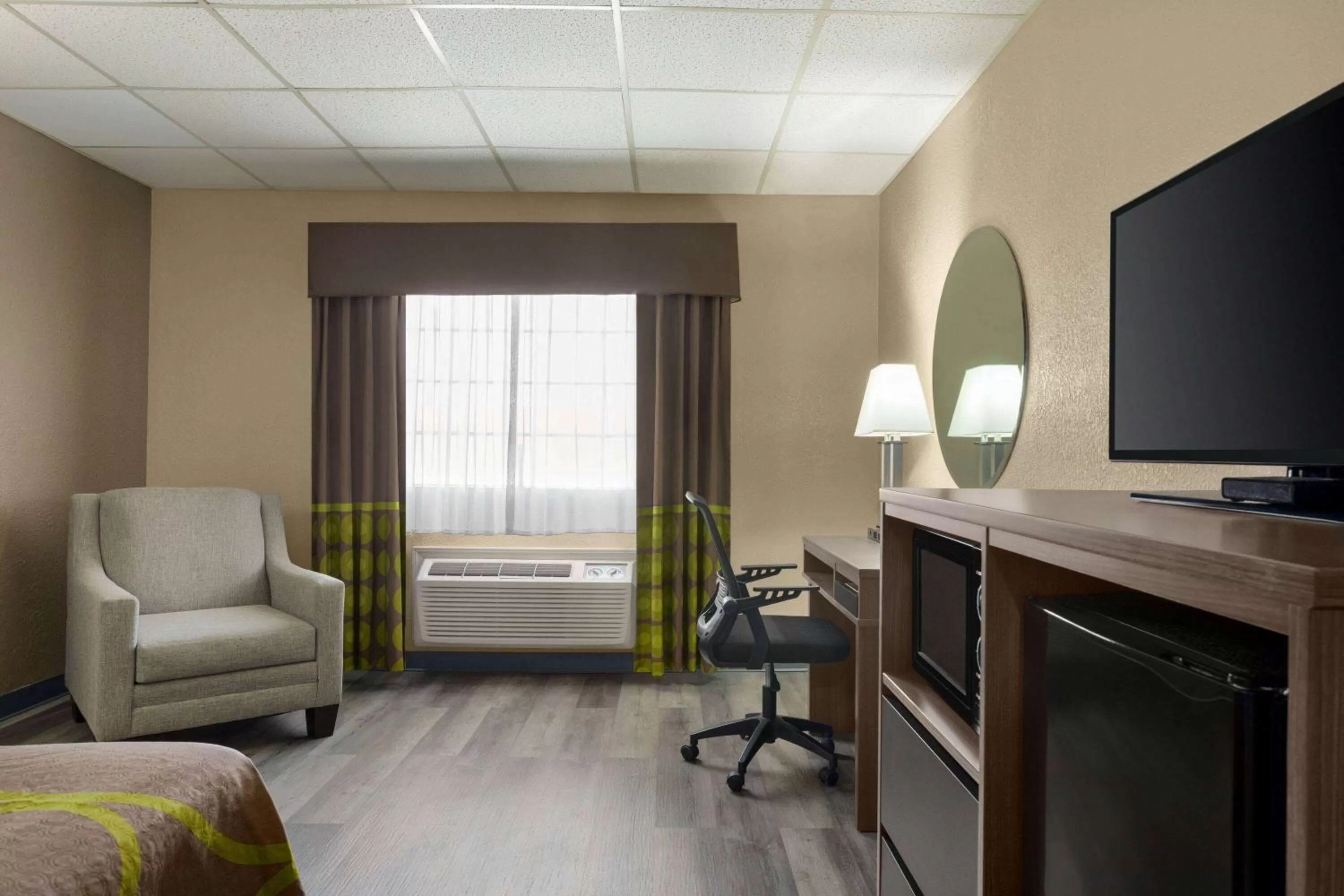 Photo of the whole room in Super 8 by Wyndham Gainesville TX