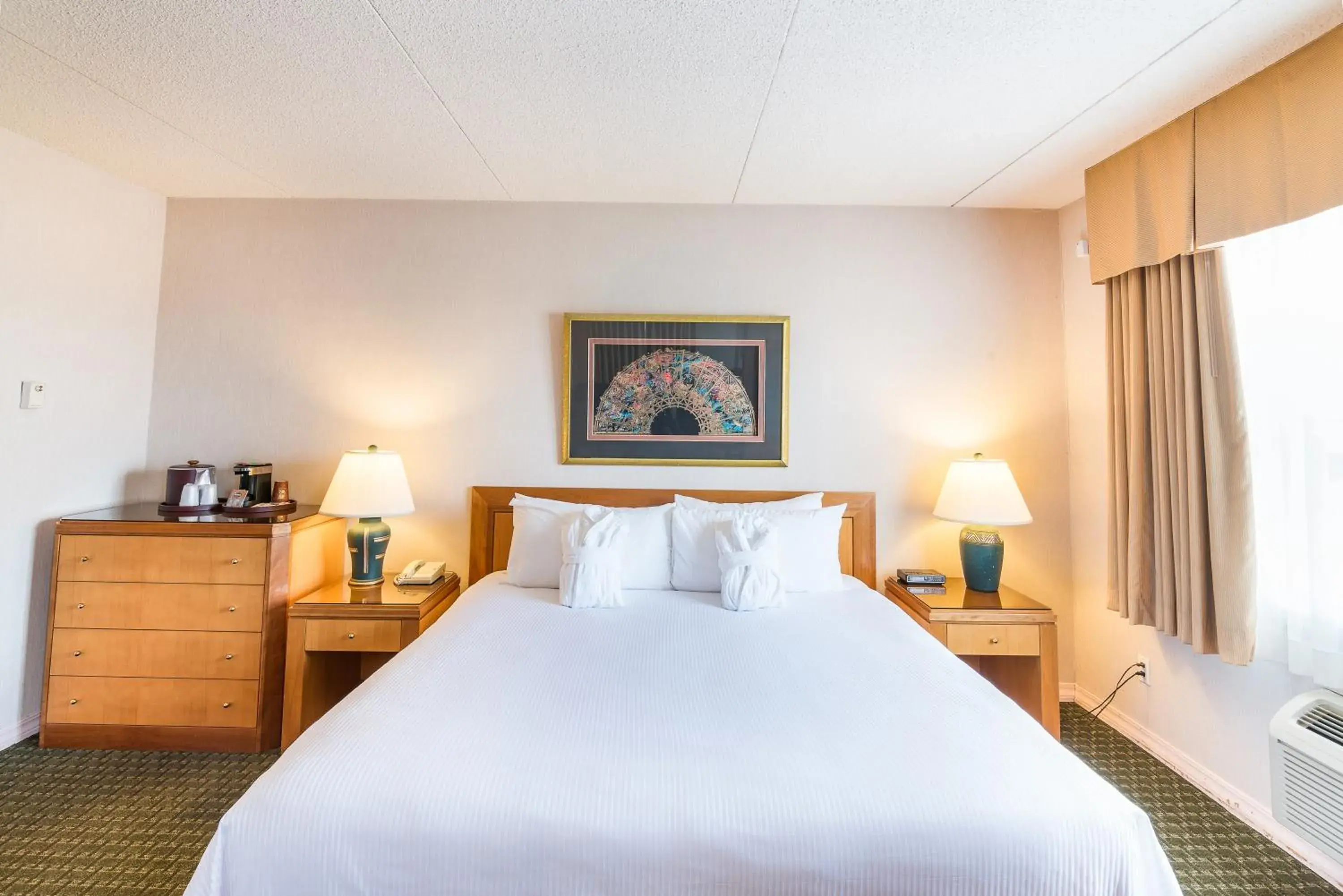 Bed in Ramada by Wyndham Thunder Bay Airlane Hotel