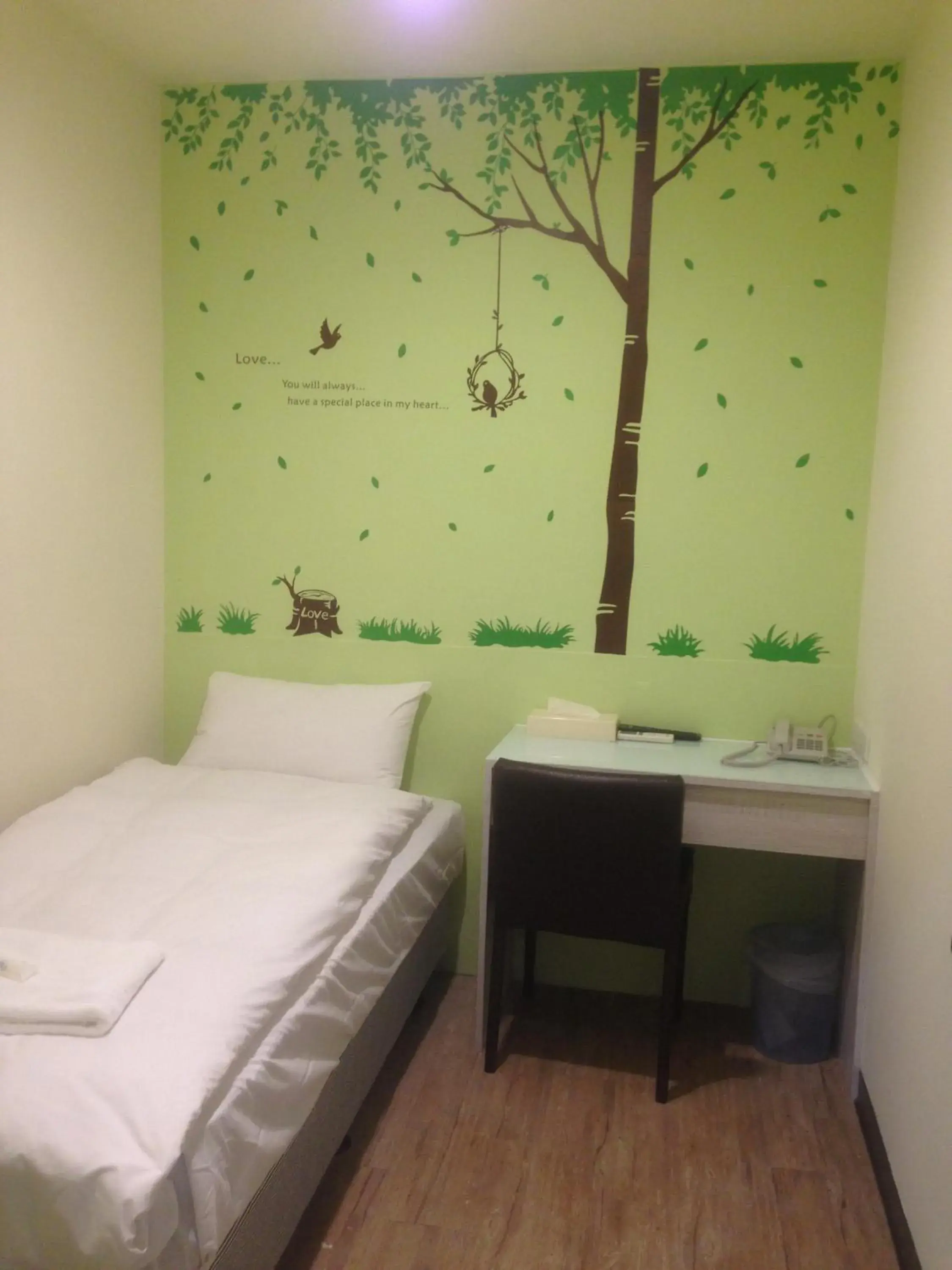 Photo of the whole room, Bed in Galaxy Mini Inn