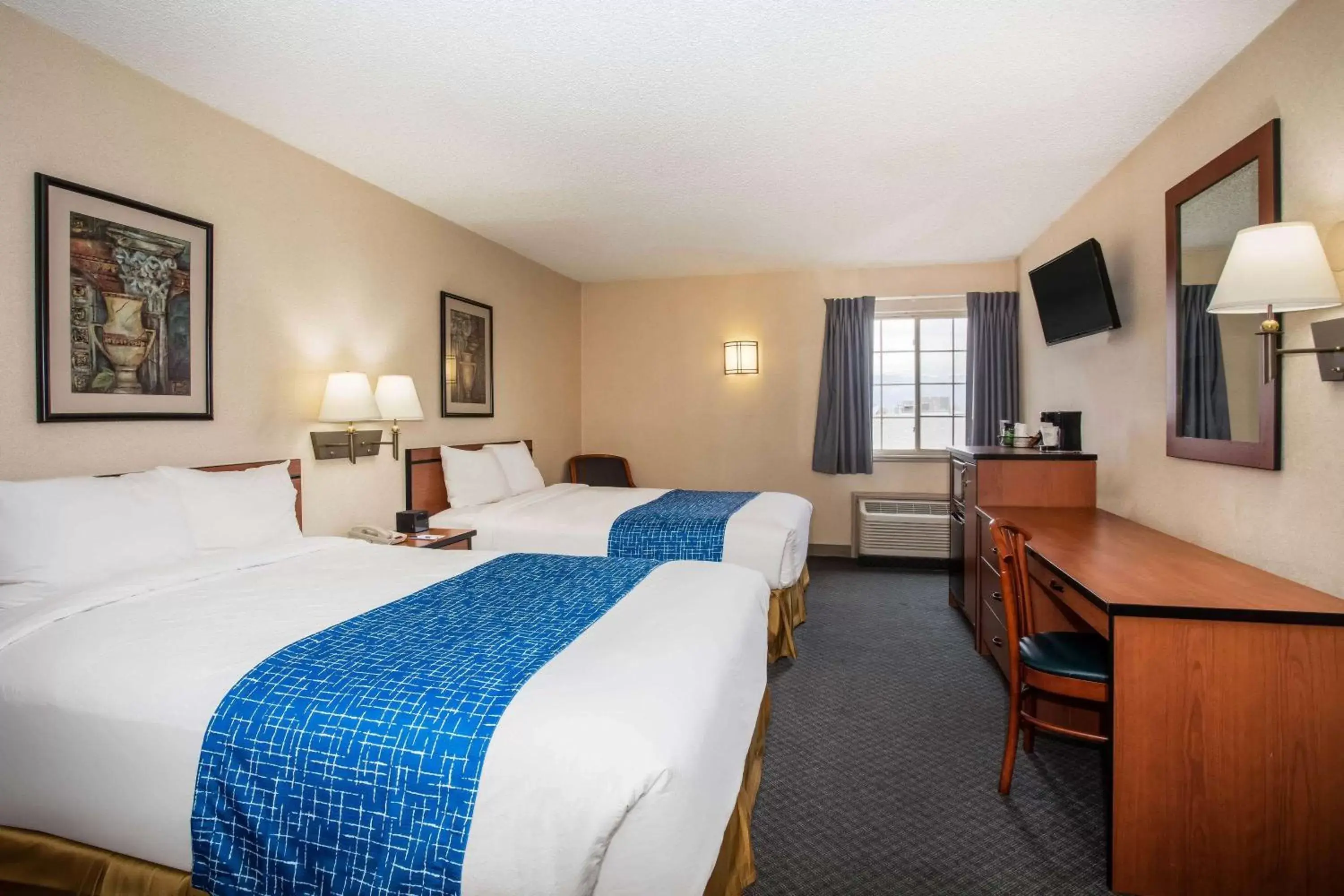 Photo of the whole room in Travelodge by Wyndham Colorado Springs Airport/Peterson AFB