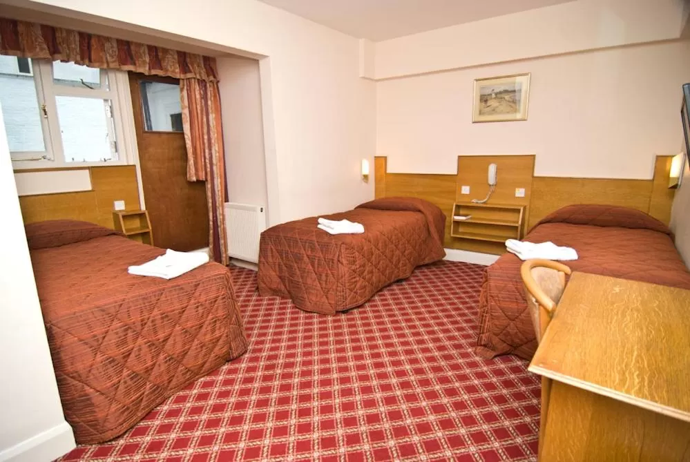 Bed in Alexandra Hotel