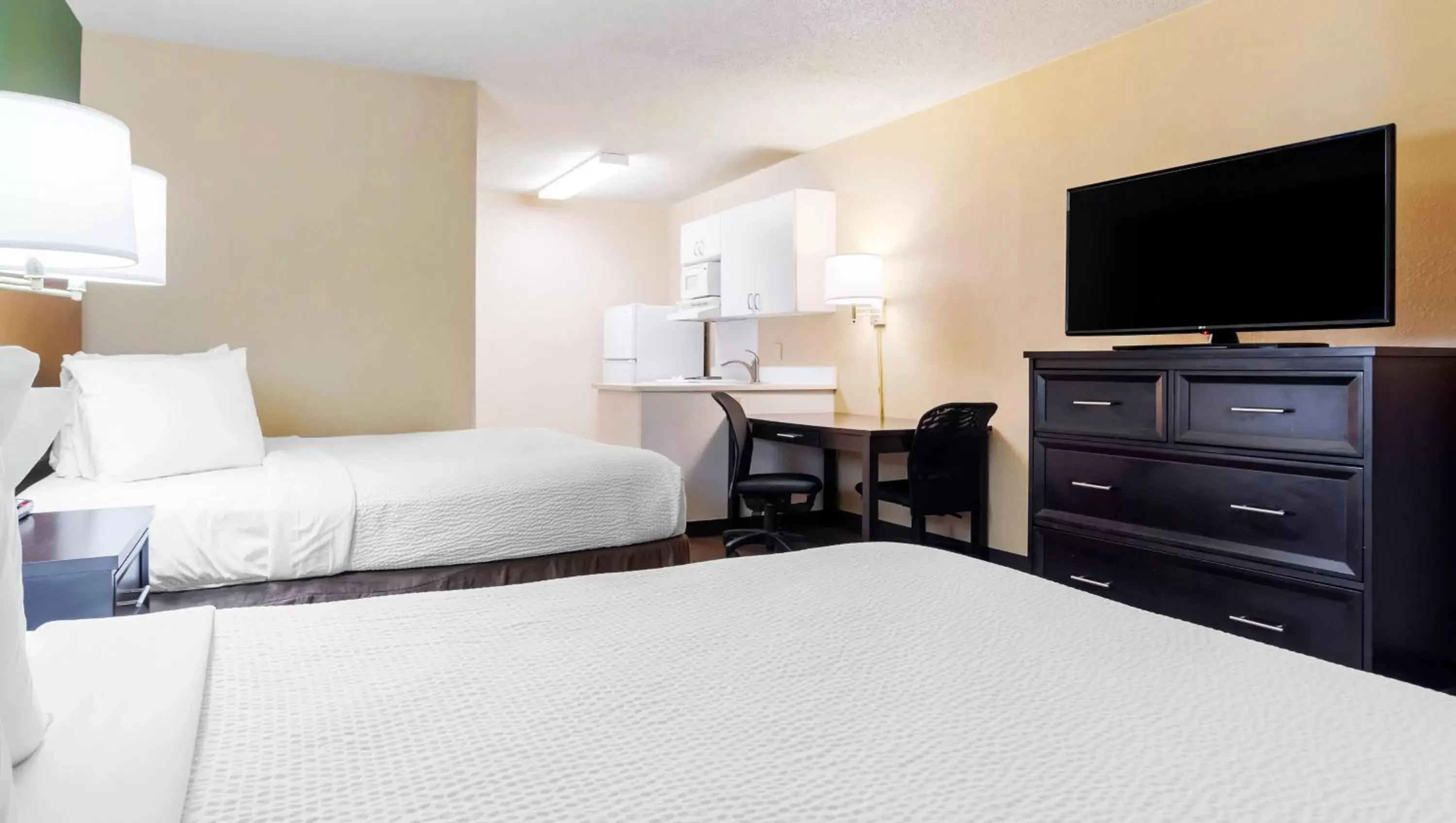 Bedroom, Bed in Home 1 Suites Extended Stay