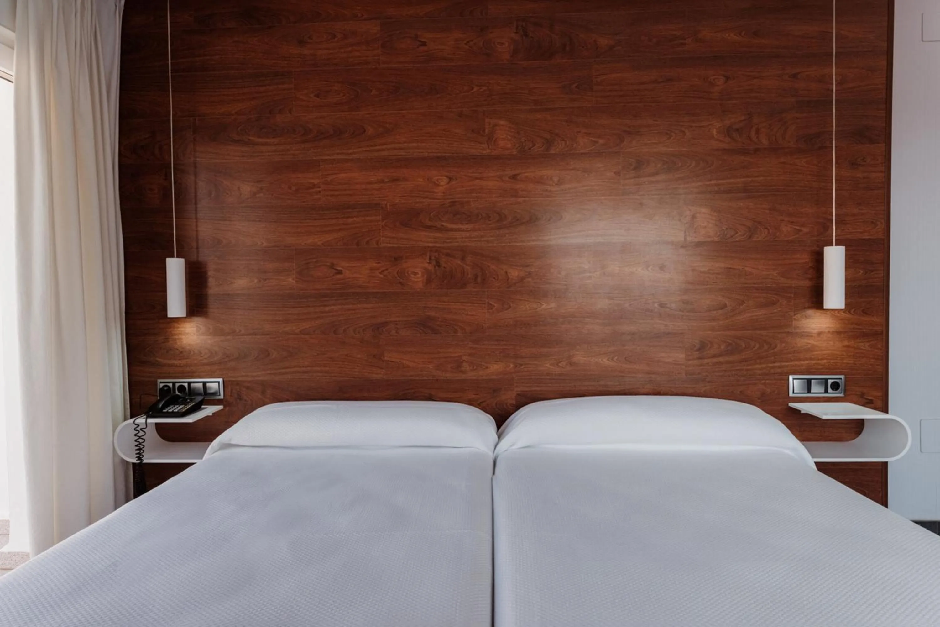 Bed in Hotel Los Delfines