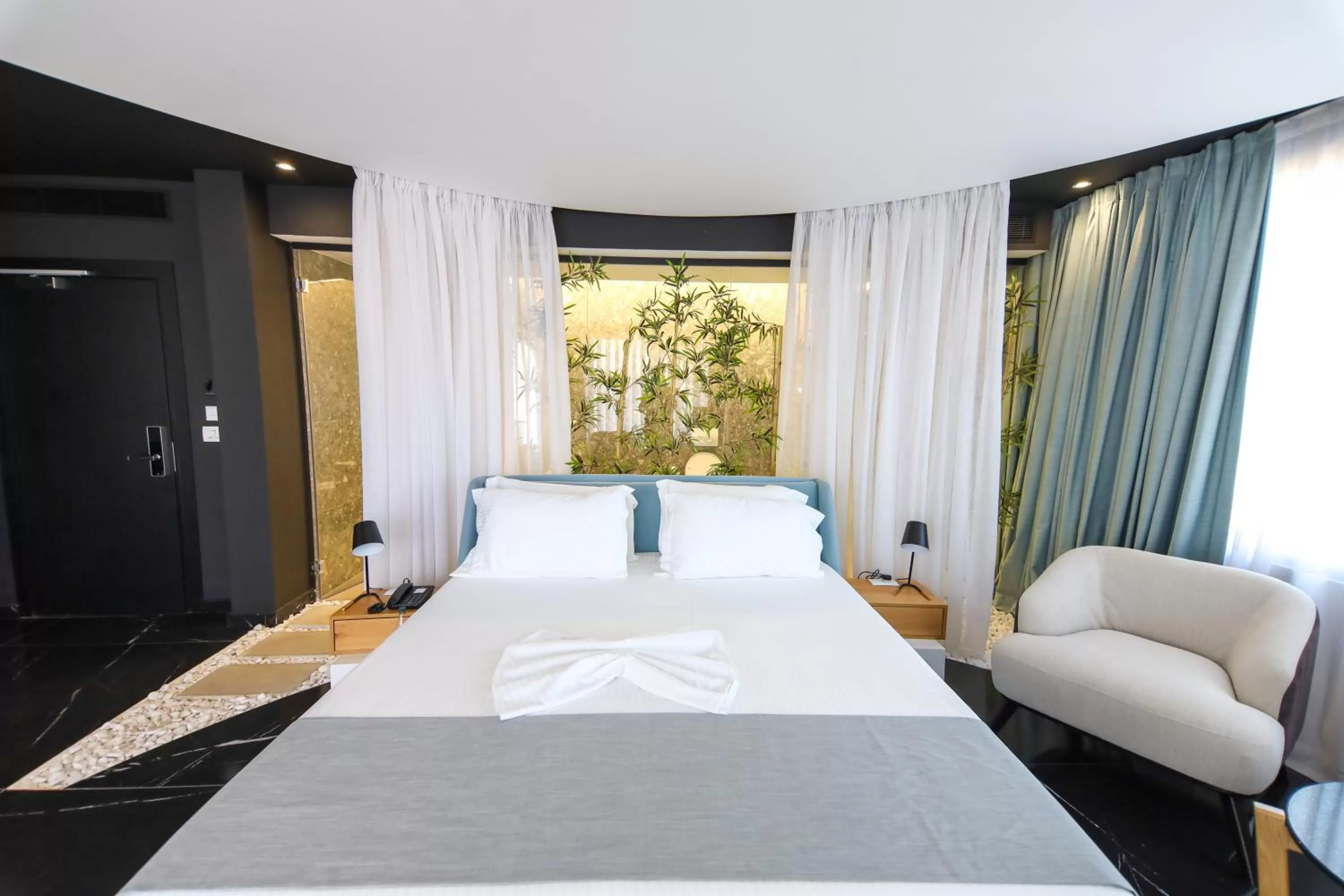 Bed in Amara Hotel & SPA