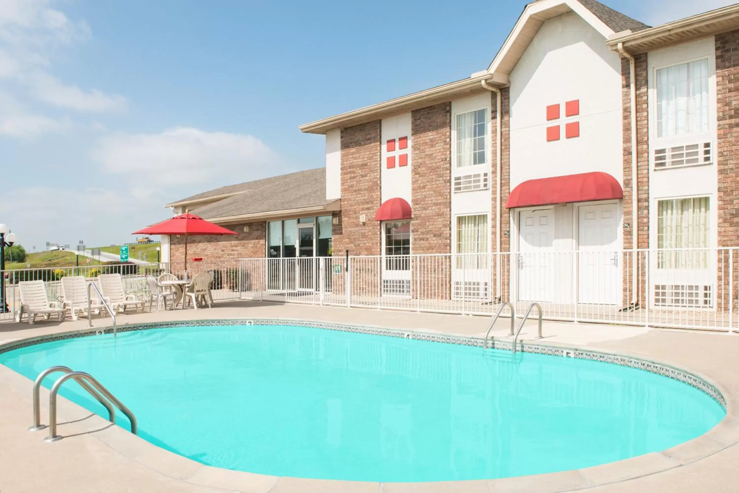 Swimming pool, Property Building in Super 8 by Wyndham Lamar