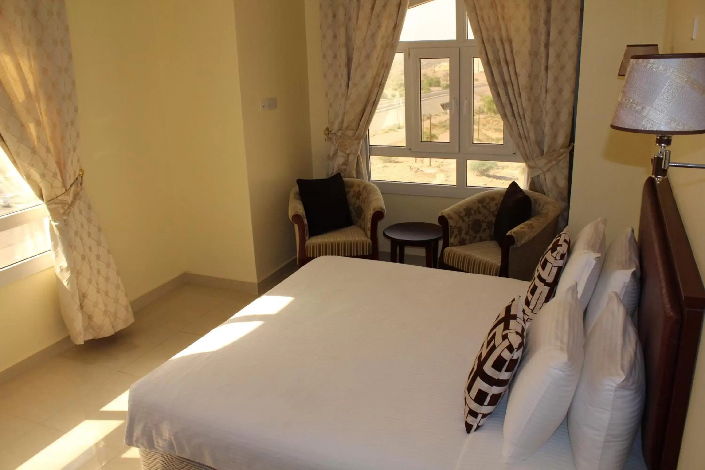 Day, Bed in Nizwa Hotel Apartments
