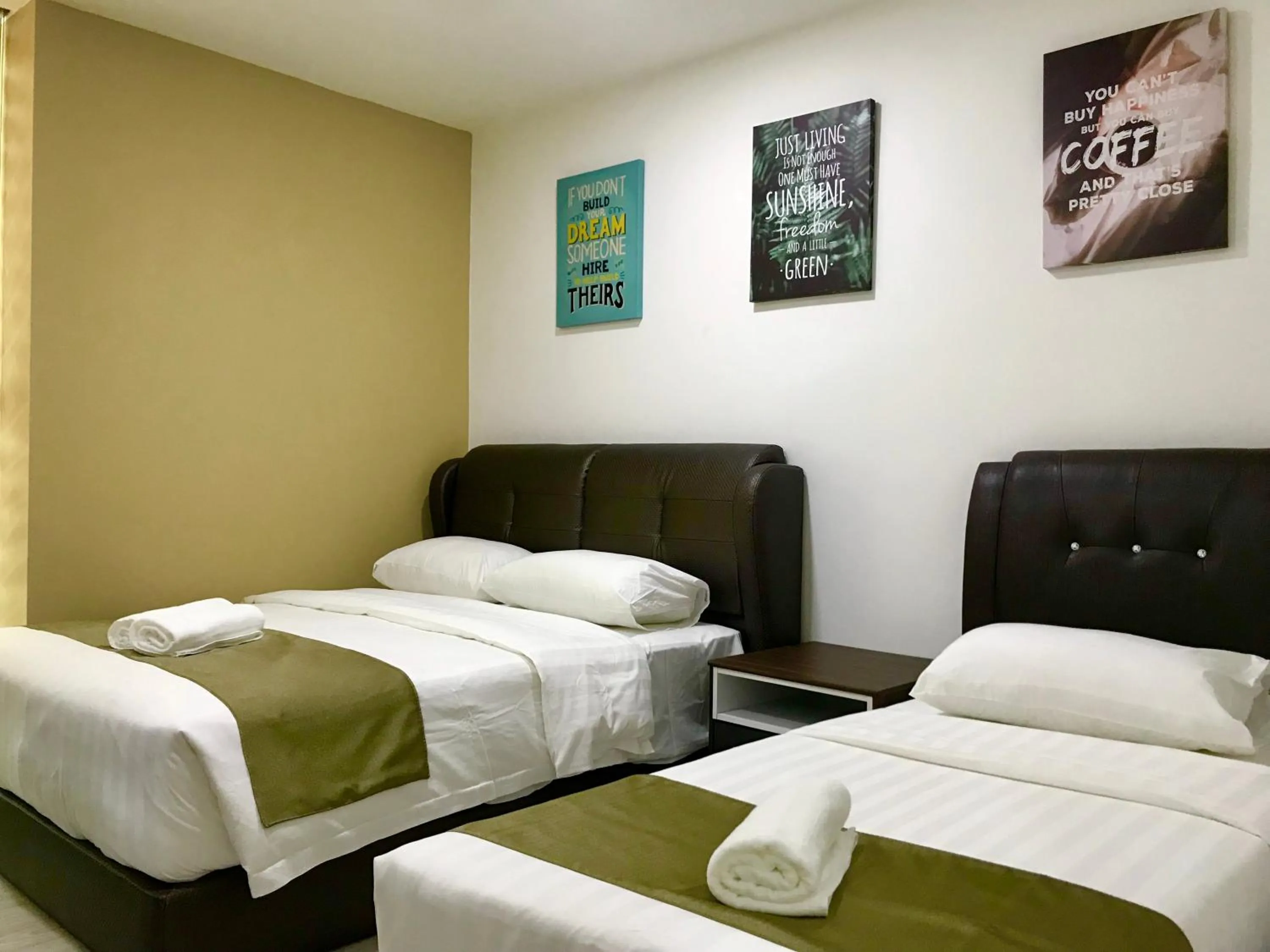 Bed in Sunset Seaview Vacation Condos @ Infinity Avenue