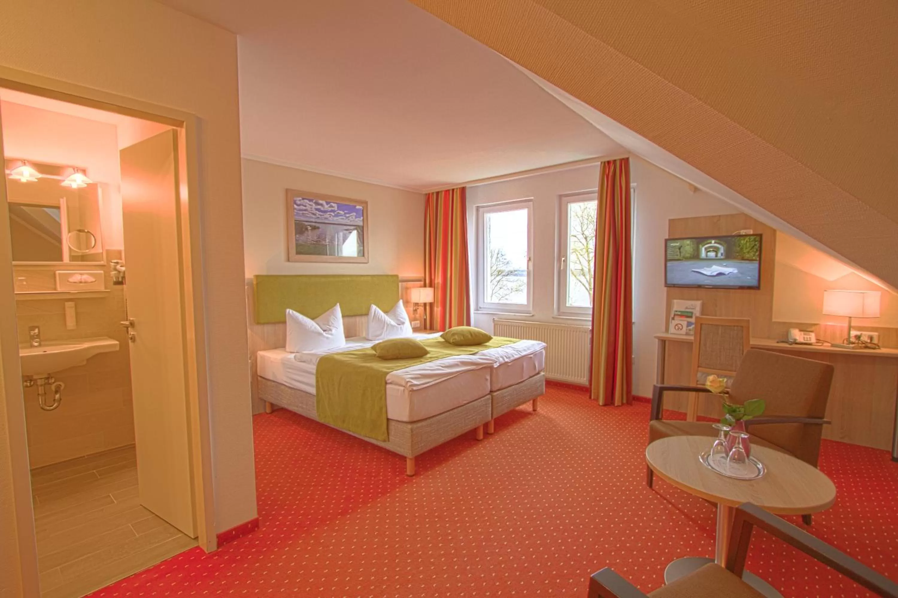 Photo of the whole room, Bed in Falk Seehotel Plau am See