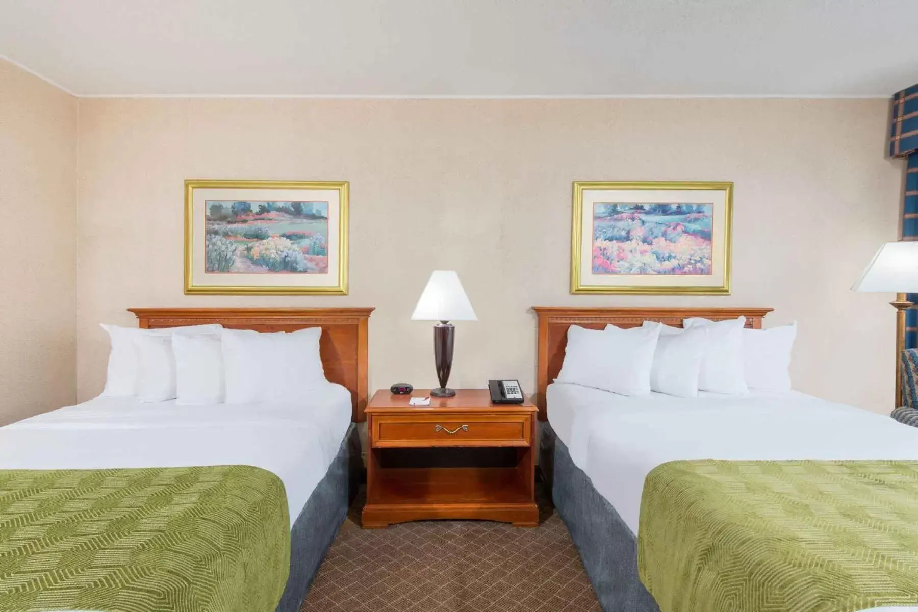 Bed in Ramada by Wyndham Cumberland Downtown