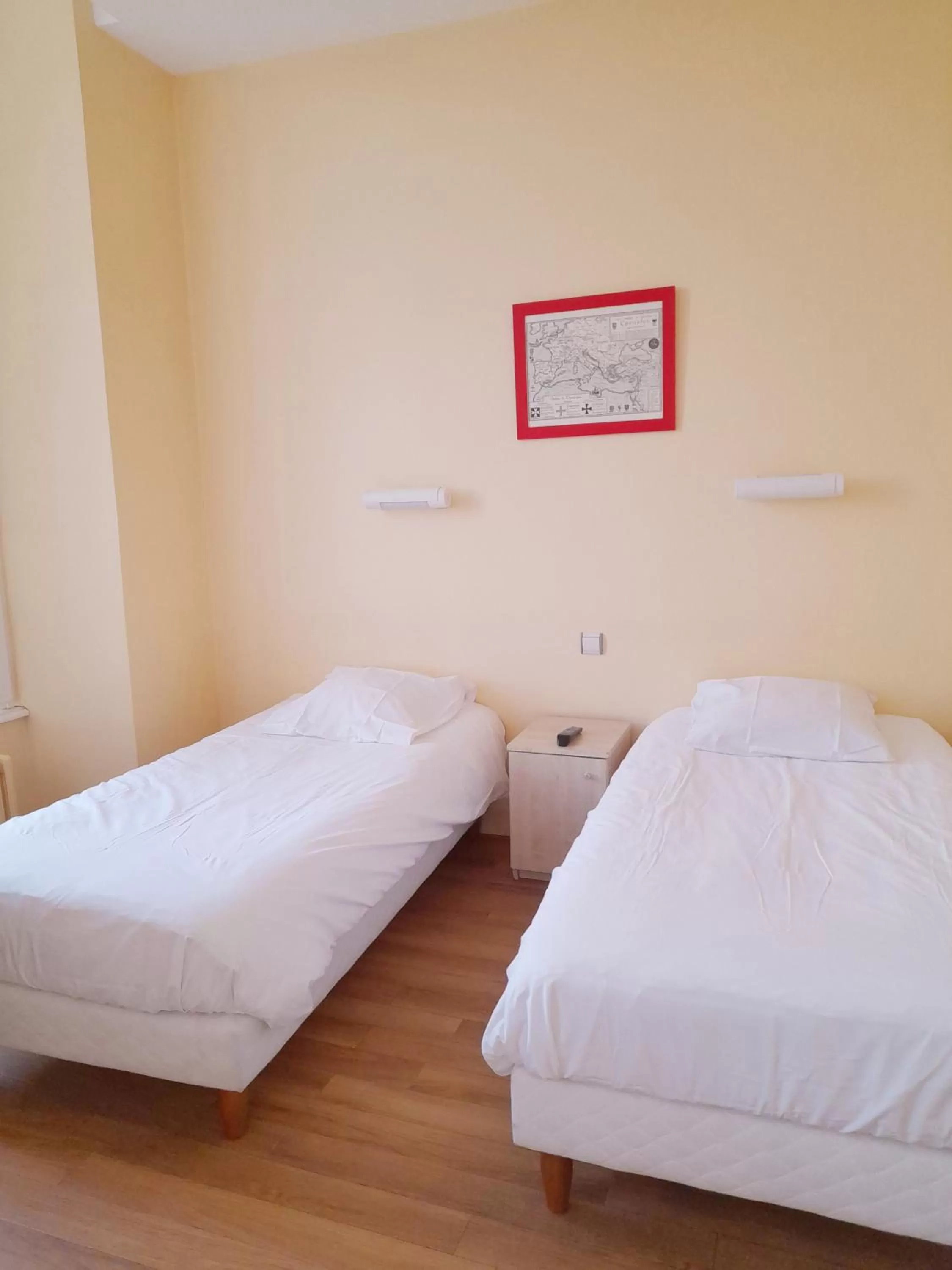 Bed in Hôtellerie Saint Yves