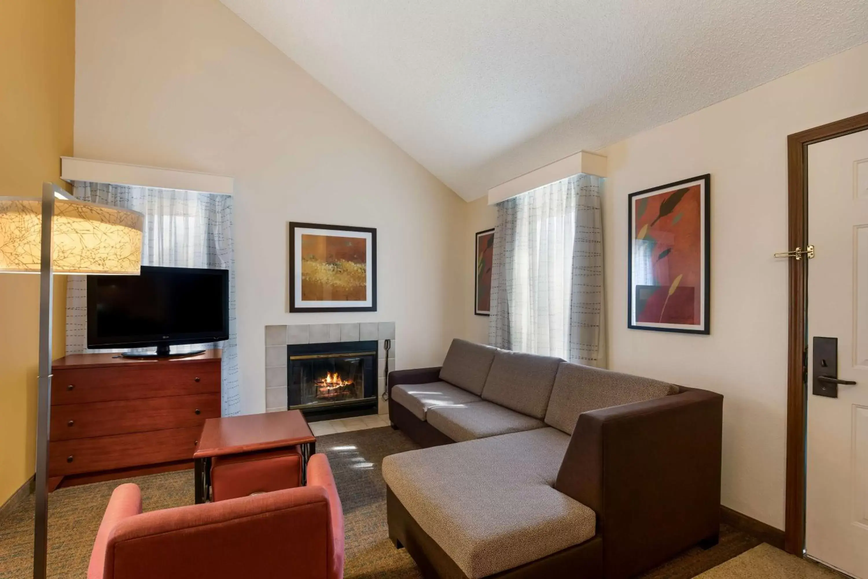 Photo of the whole room, Seating Area in SenS Suites Livermore; SureStay Collection by Best Western
