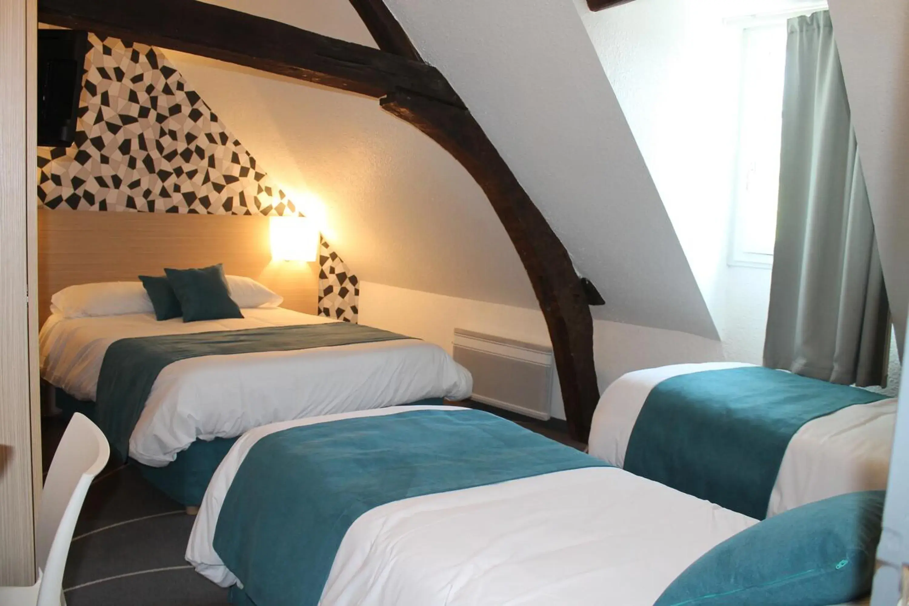 Bed in Hôtel Le Blason