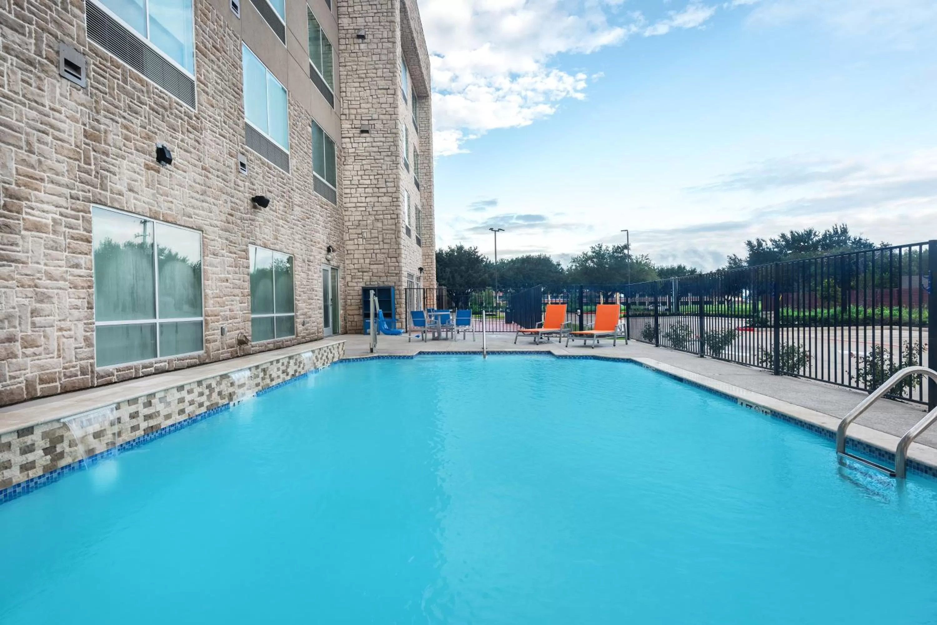 Swimming pool in Holiday Inn Express & Suites- Sugar Land SE - Missouri City by IHG