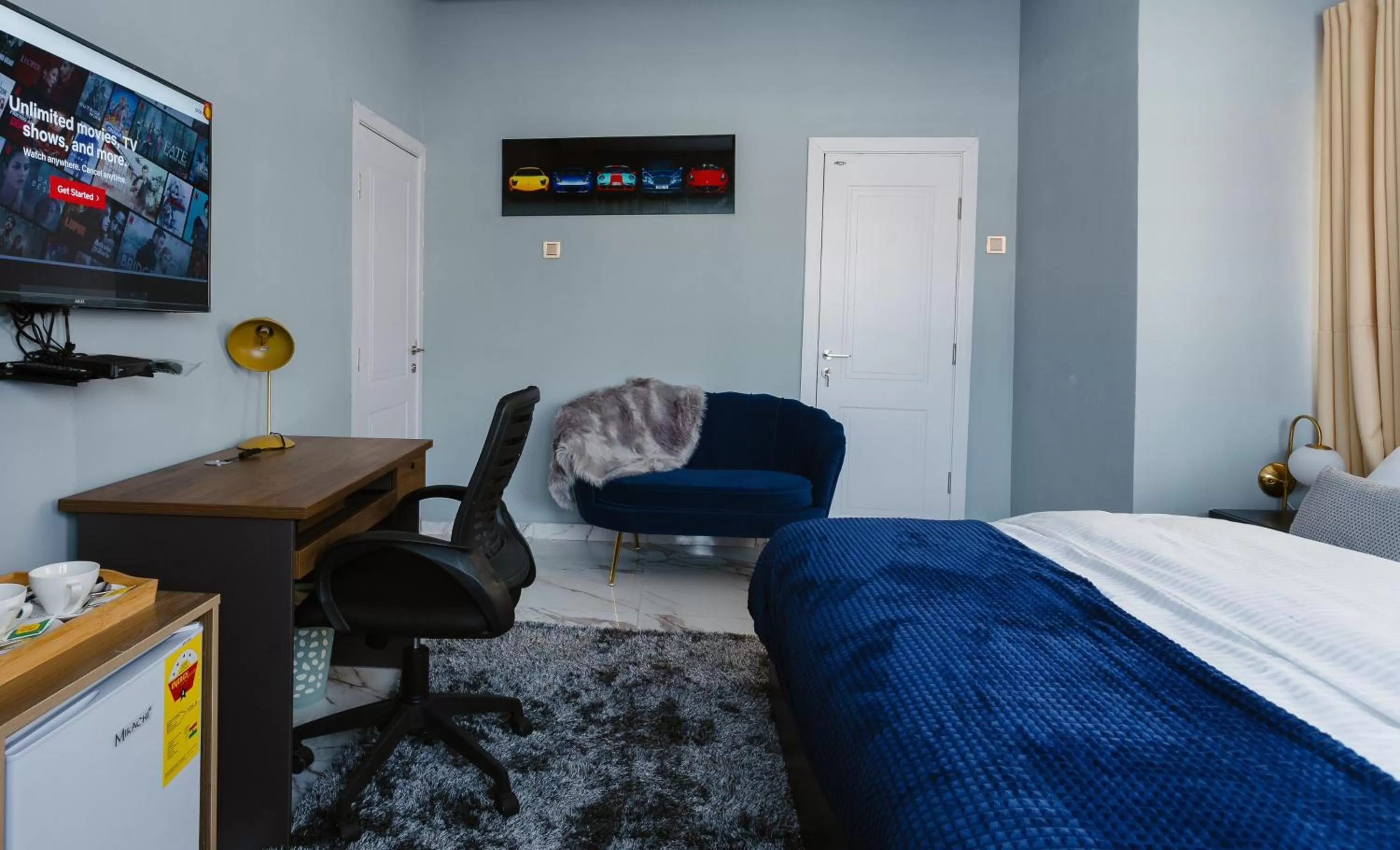 TV and multimedia, Bed in The Avery Suites, East Legon