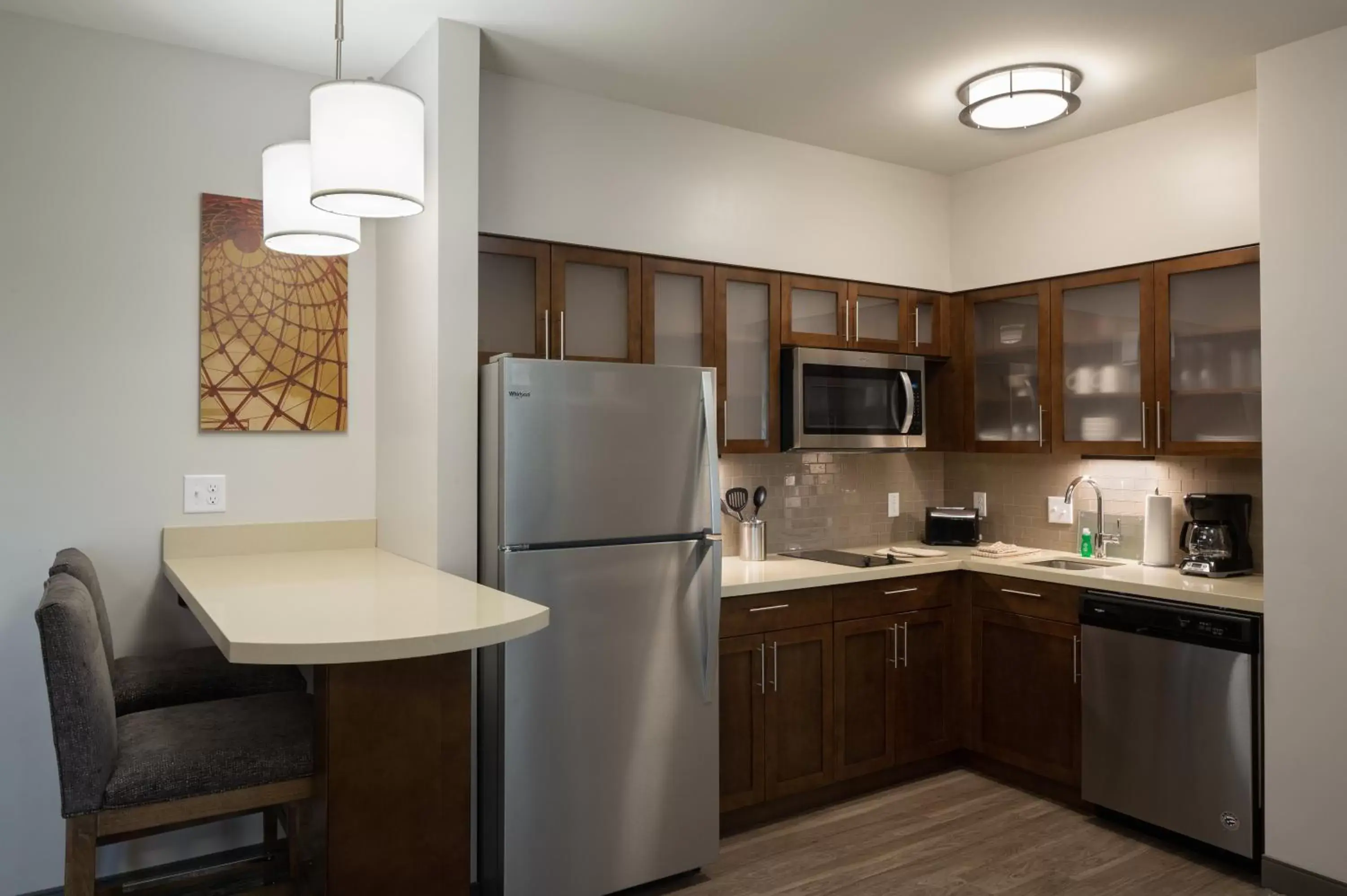 Bedroom, Kitchen/Kitchenette in Staybridge Suites - Phoenix – Biltmore Area, an IHG Hotel