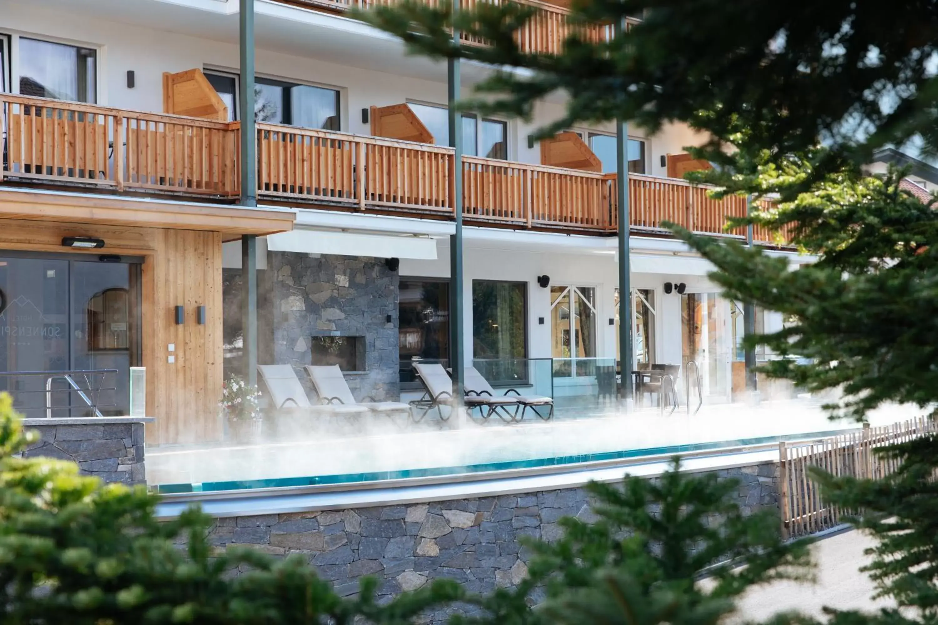 Property building, Swimming Pool in Hotel Sonnenspitze