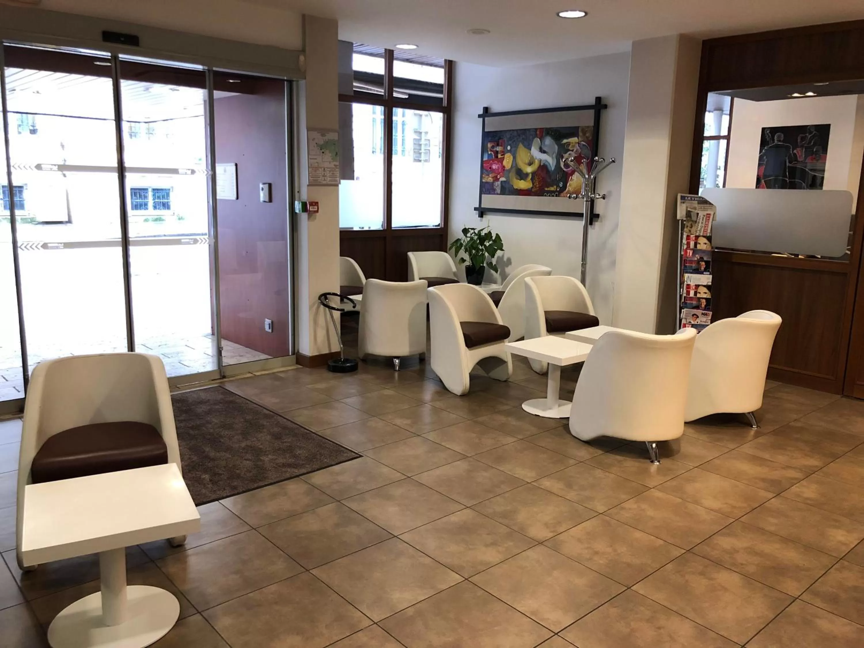 Lobby or reception in Cit'Hotel Stim'Otel