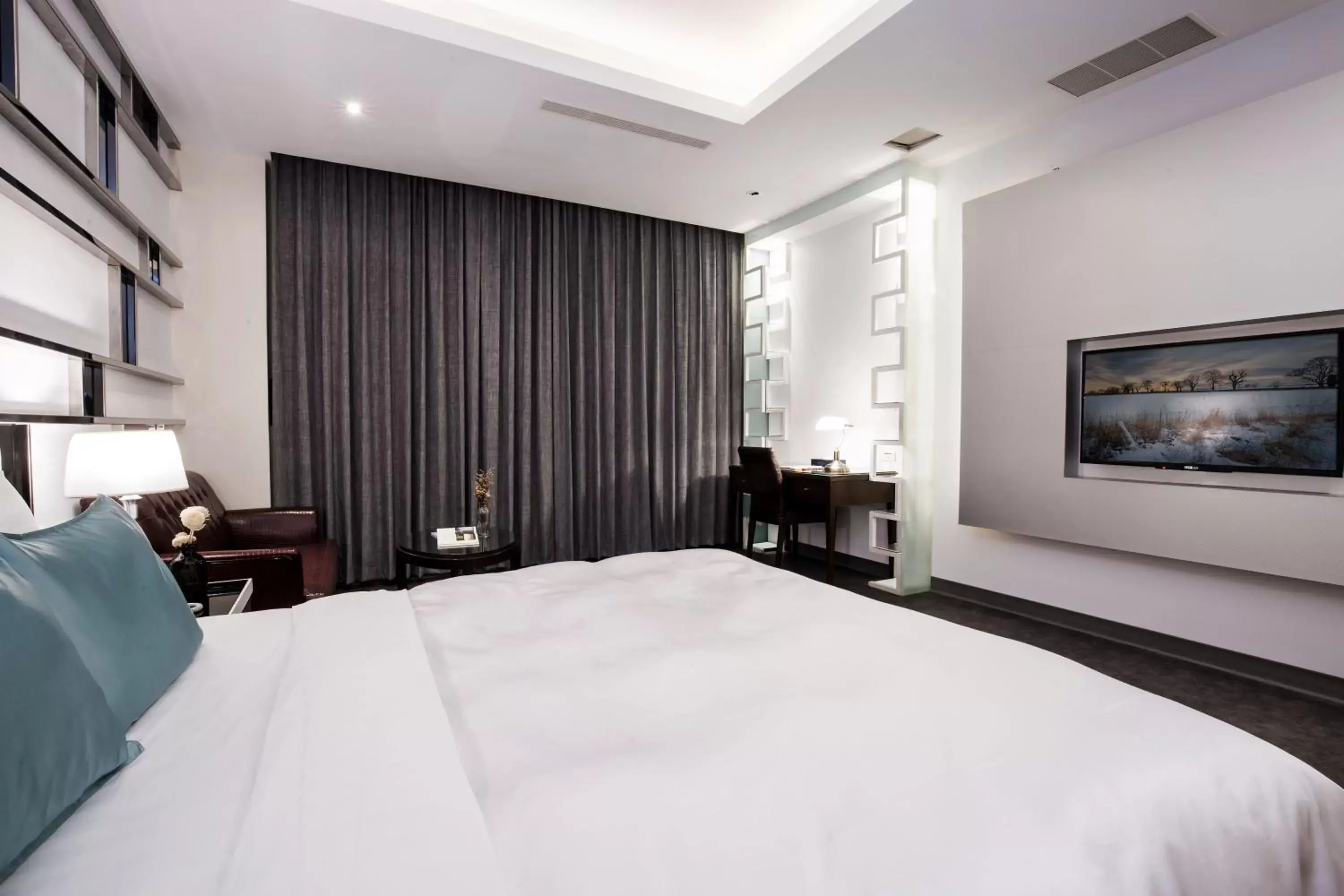 Bed in Duo Romance Hotel
