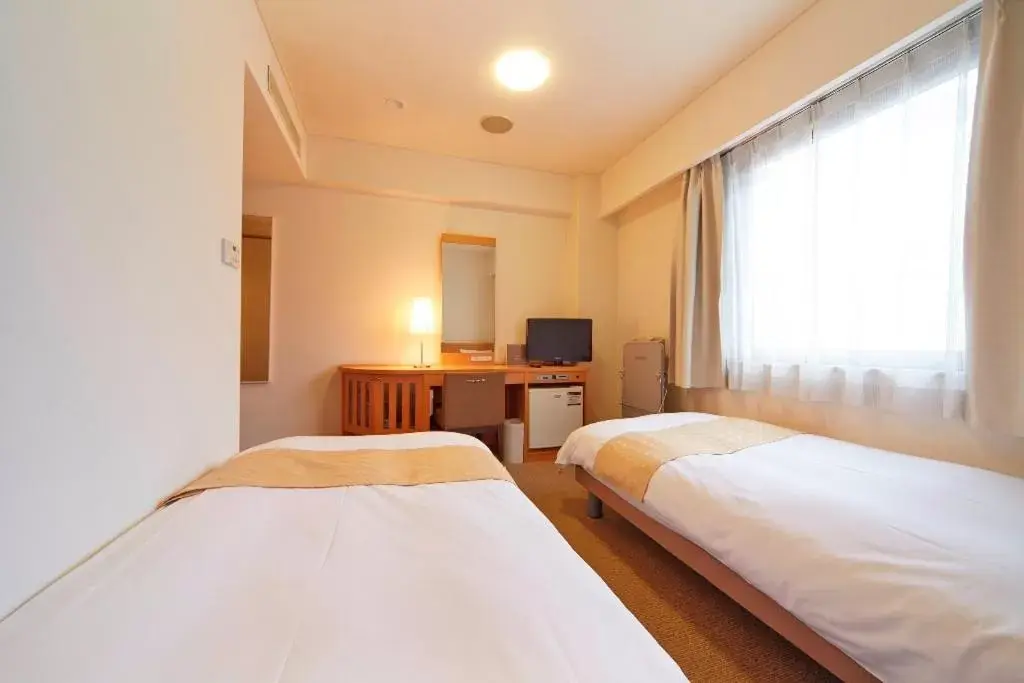 Bed in Nest Hotel Kumamoto
