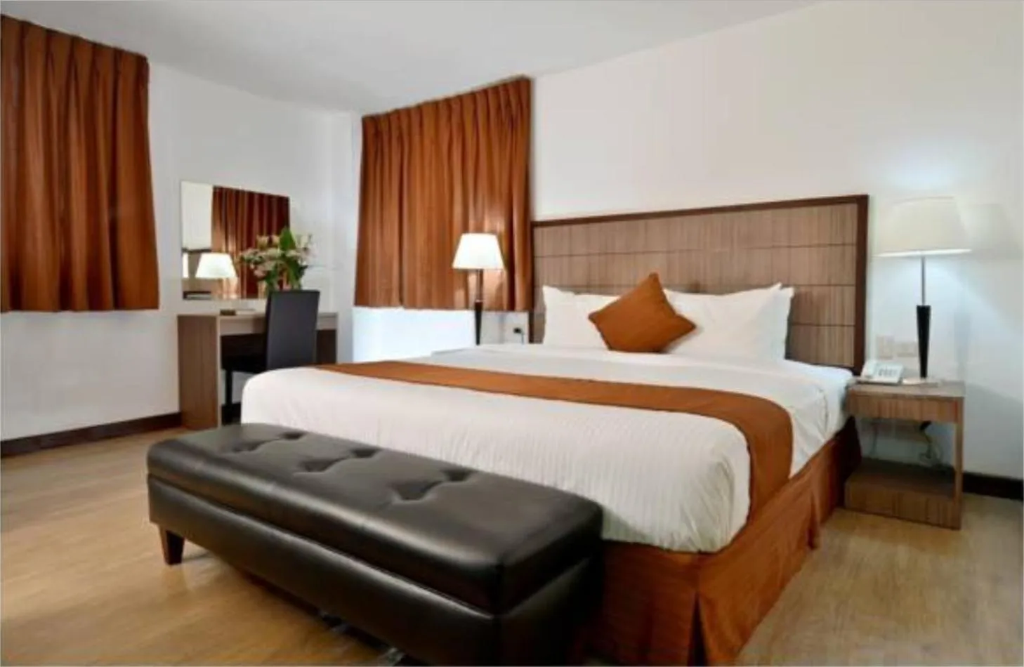 Bed in Tyche Boutique Hotel