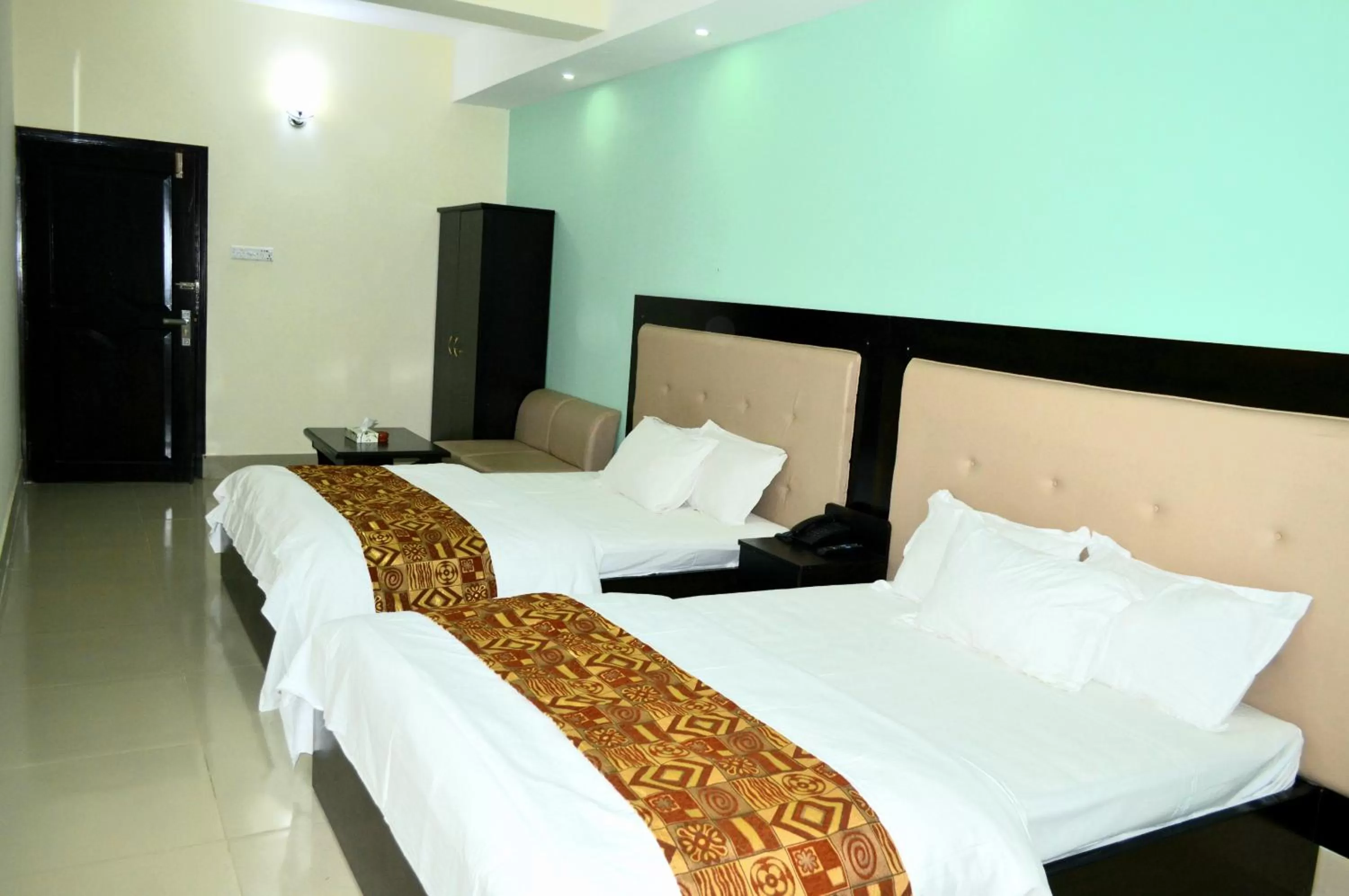 Bed in Grand Surma Hotel