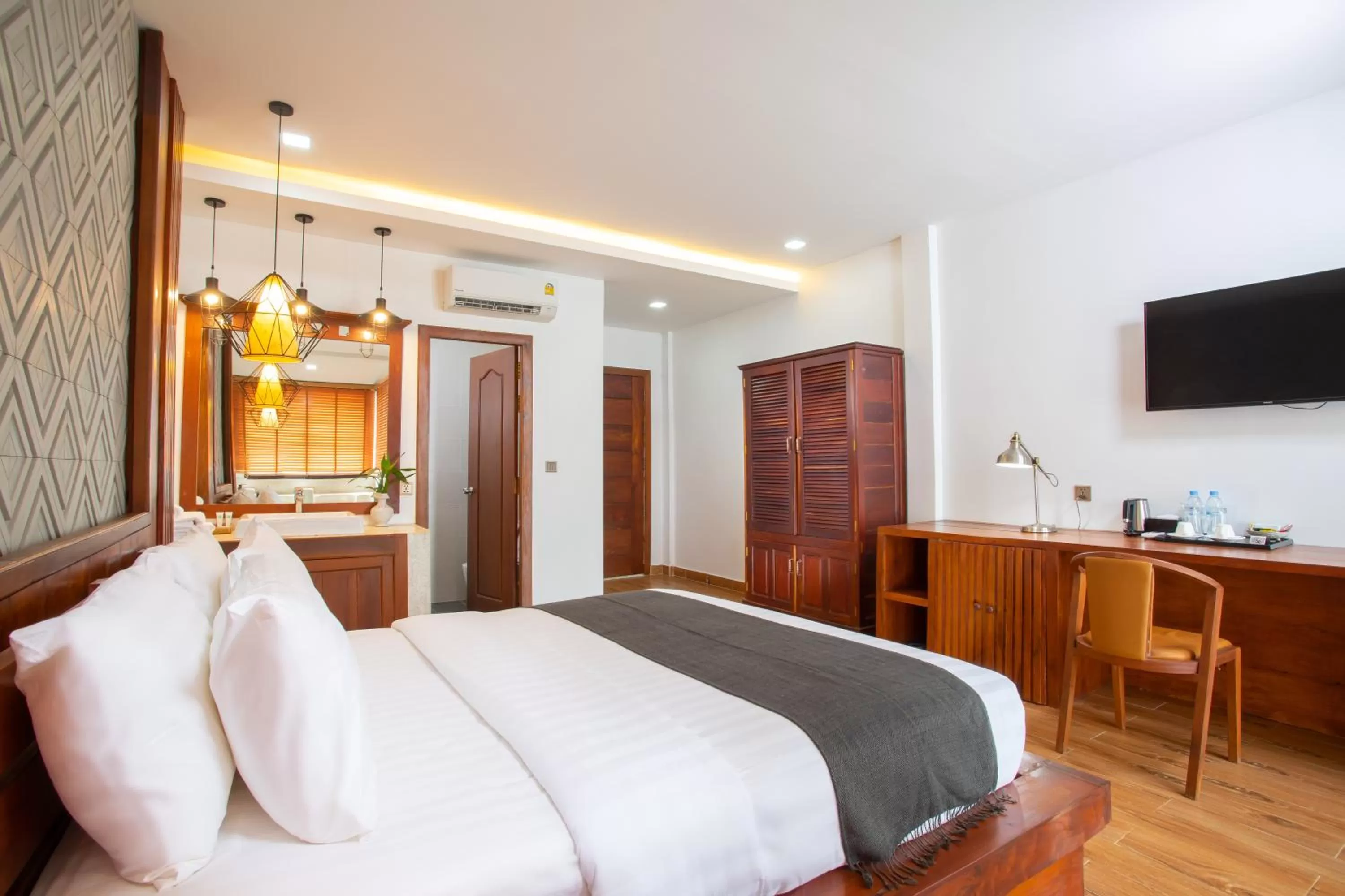 Bedroom in Cambana La Riviere Boutique