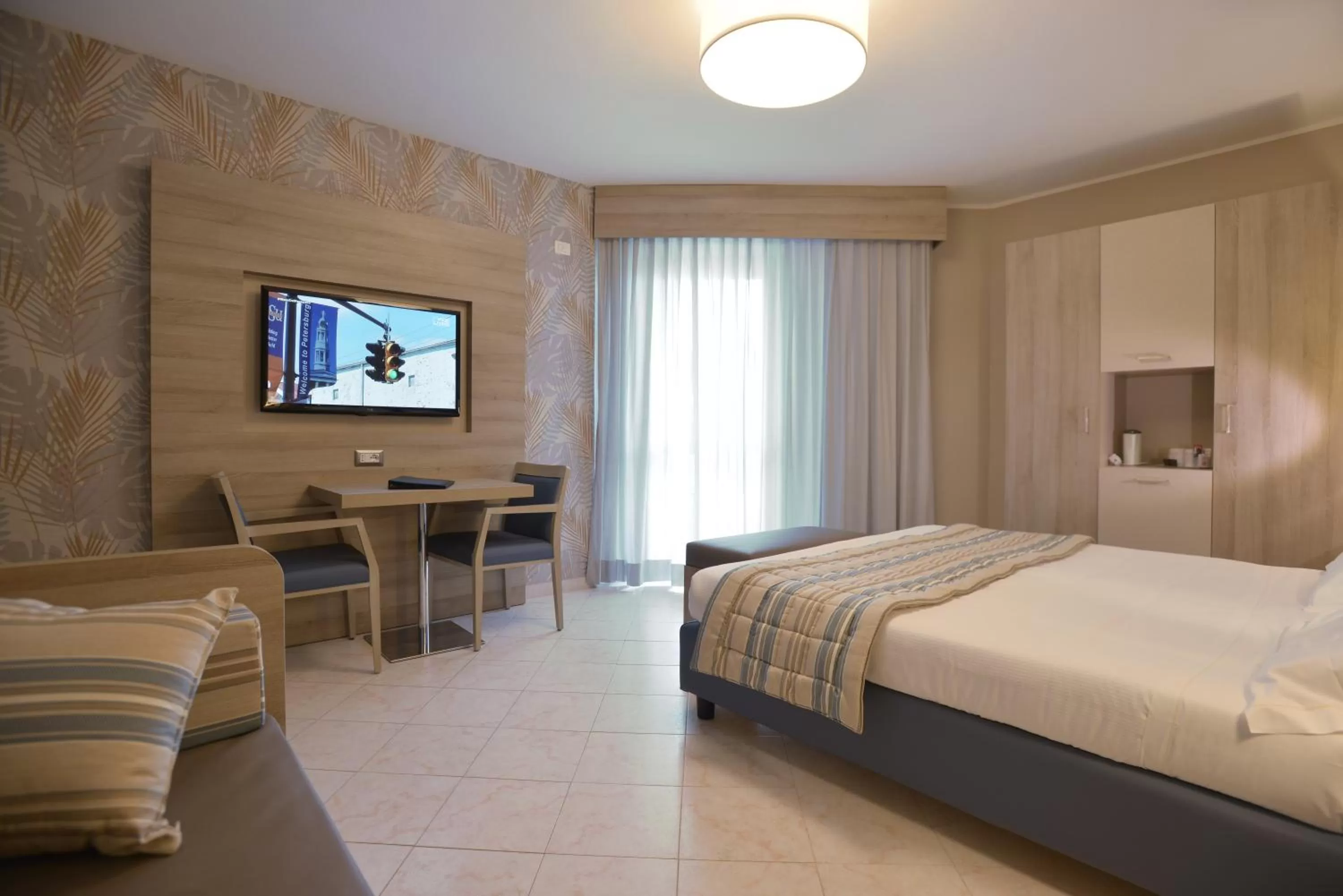 Photo of the whole room, Bed in Alma di Alghero Hotel