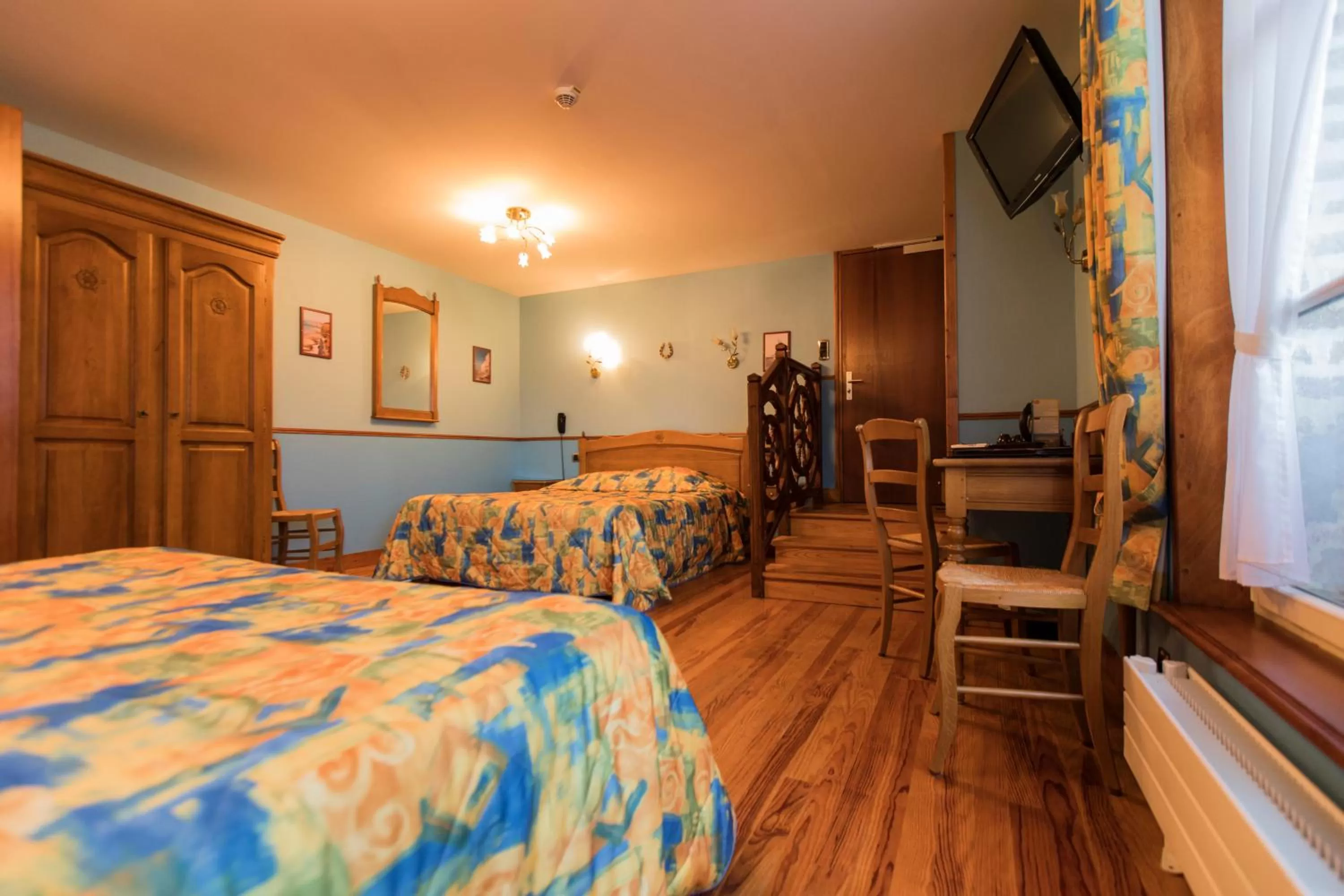 Bed in Hôtel De Calais