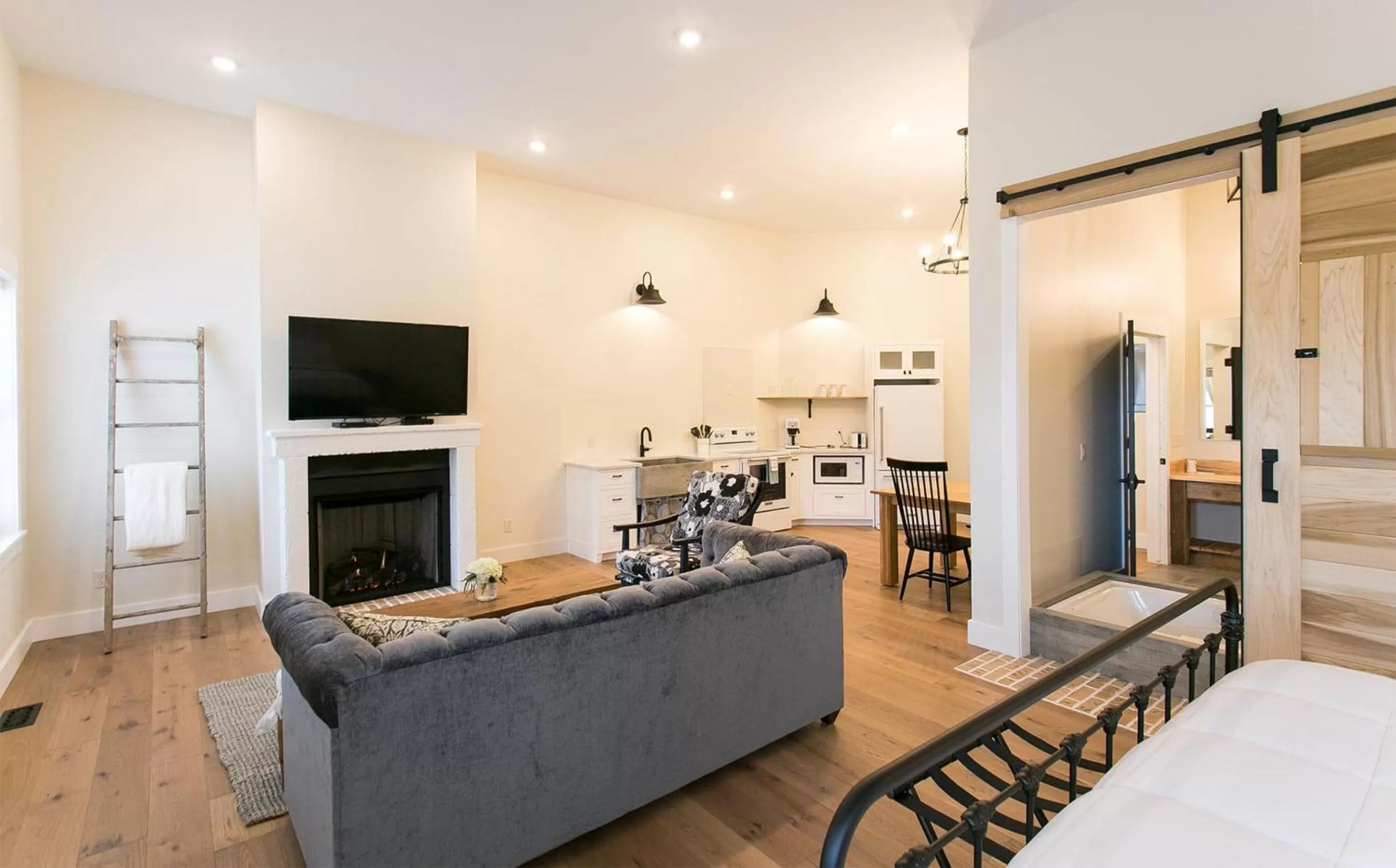 TV and multimedia, Seating Area in Farmhouse Suites by Amish Country Lodging