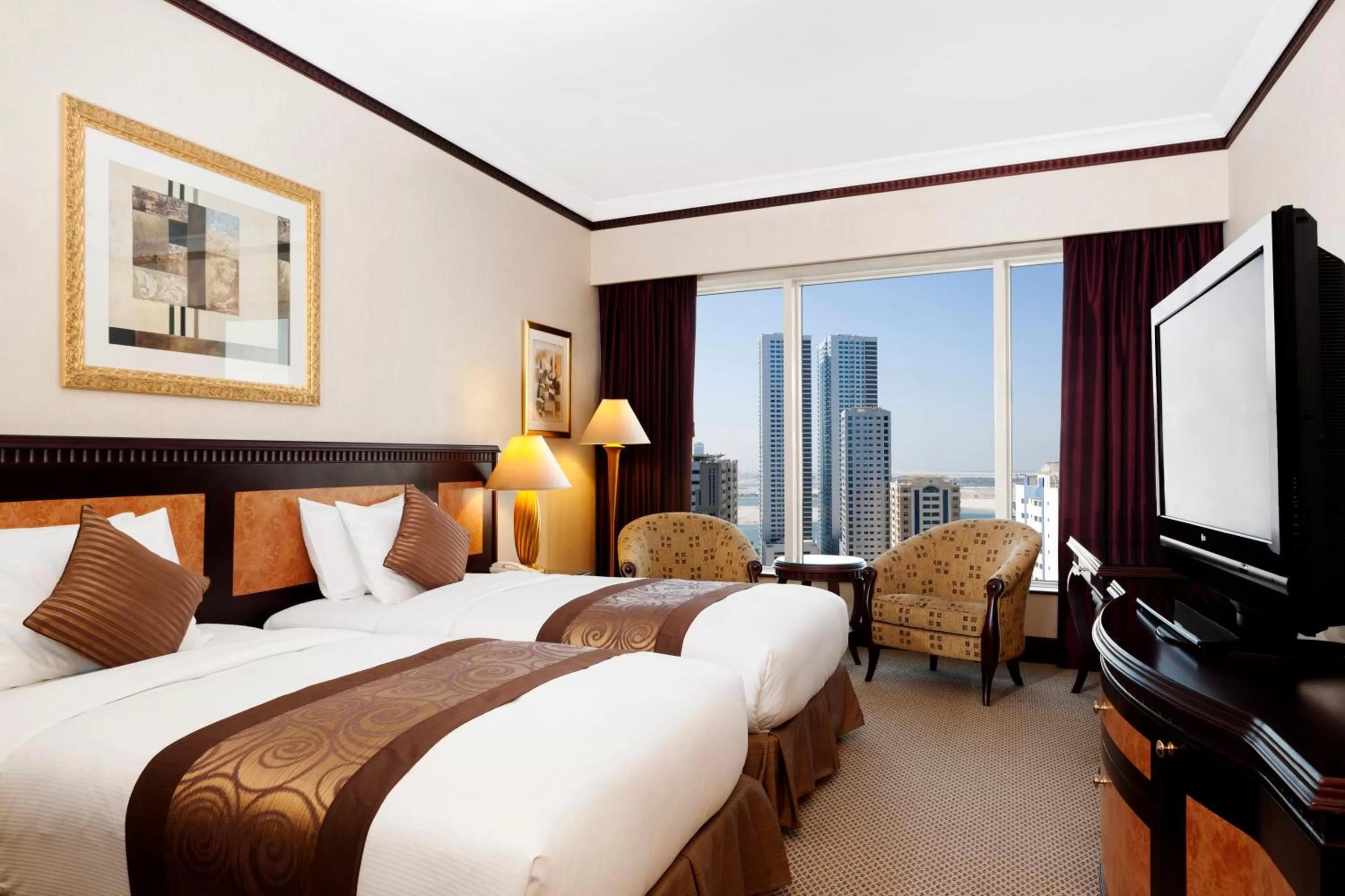 Bed in Corniche Hotel Sharjah